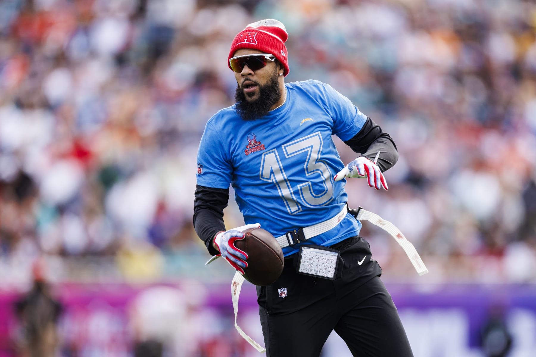 ORLANDO, FLORIDA - FEBRUARY 04: Keenan Allen #13 of the Los Angeles Chargers and AFC runs with the ball after catching a pass during the 2024 NFL Pro Bowl at Camping World Stadium on February 04, 2024 in Orlando, Florida. (Photo by James Gilbert/Getty Images)