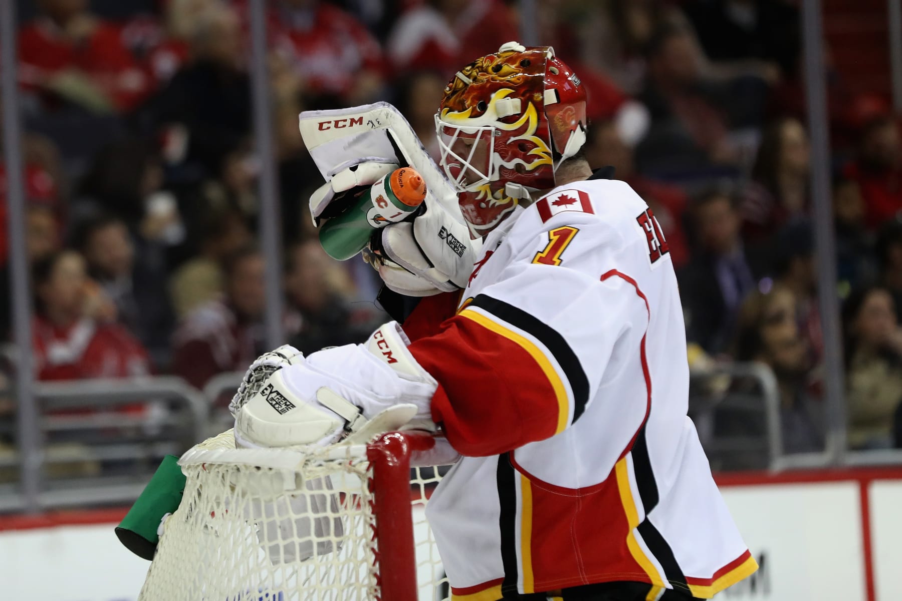 WASHINGTON, DC - MARCH 21: Goalie Brian Elliott #1 of the Calgary Flames gets a drink after giving up a second period goal against the Washington Capitals at Verizon Center on March 21, 2017 in Washington, DC. (Photo by Rob Carr/Getty Images)