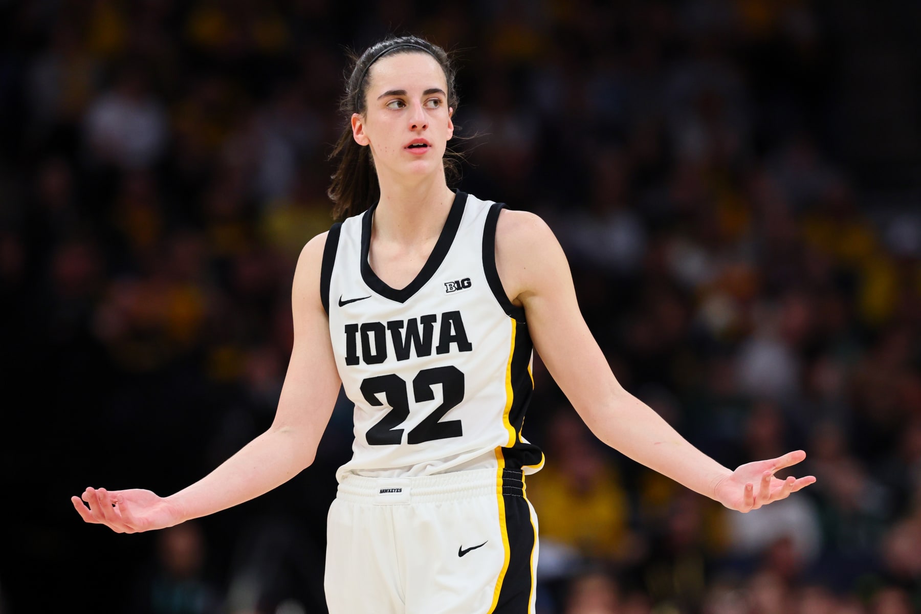MINNEAPOLIS, MINNESOTA - MARCH 10: Caitlin Clark #22 of the Iowa Hawkeyes reacts in the first half against the Nebraska Cornhuskers during the Big Ten Women's Basketball Tournament Championship at Target Center on March 10, 2024 in Minneapolis, Minnesota. (Photo by Adam Bettcher/Getty Images)