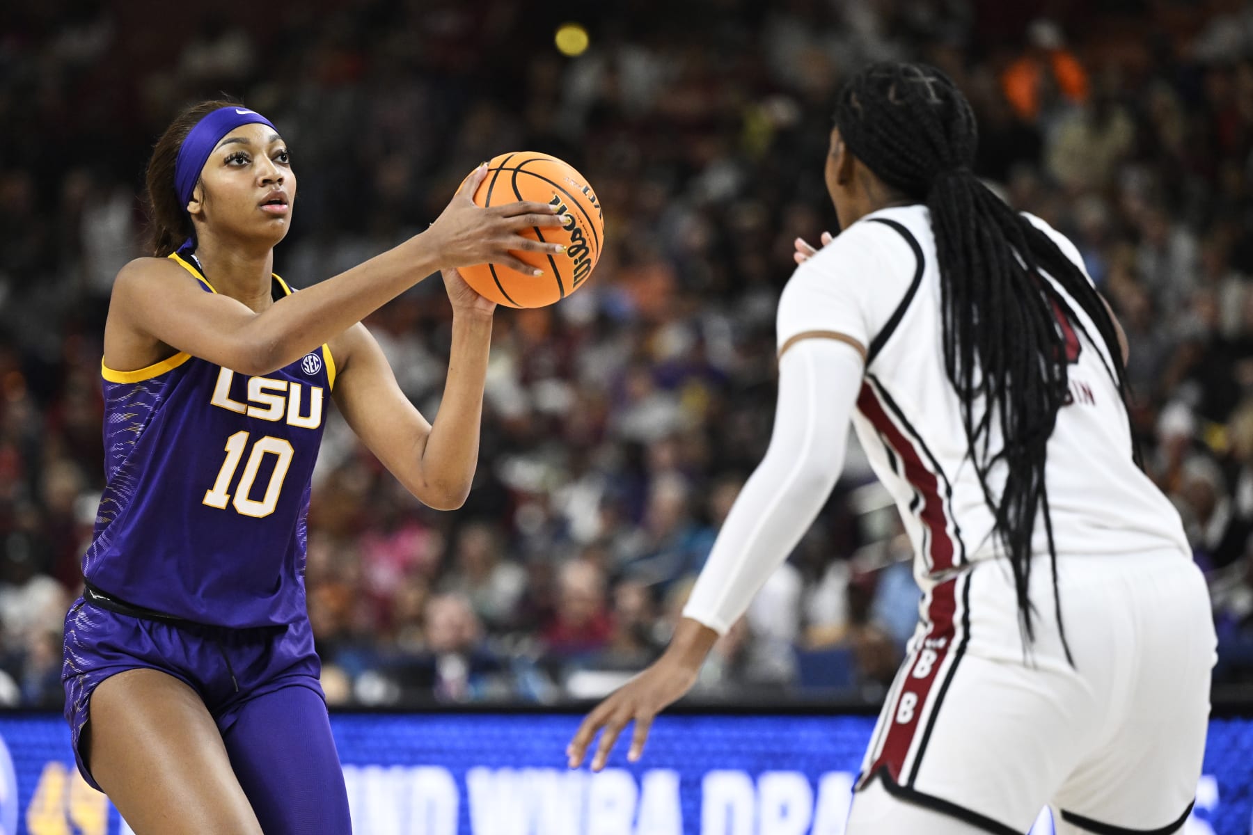 GREENVILLE, SOUTH CAROLINA - MARCH 10: Angel Reese #10 of the LSU Lady Tigers shoots a basket against Sania Feagin #20 of the South Carolina Gamecocks in the second quarter during the championship game of the SEC Women's Basketball Tournament at Bon Secours Wellness Arena on March 10, 2024 in Greenville, South Carolina. (Photo by Eakin Howard/Getty Images)