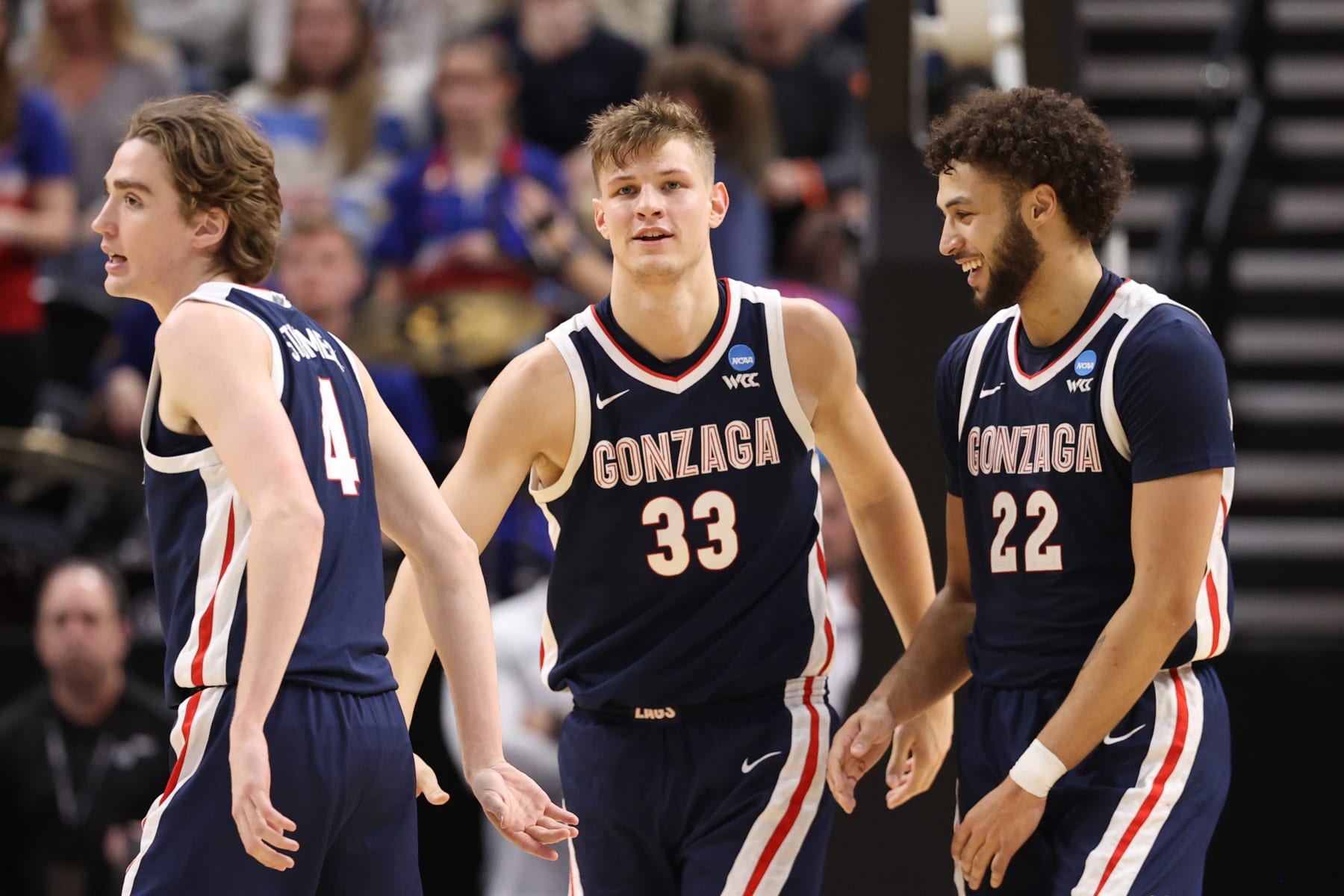 SALT LAKE CITY, UTAH - MARCH 23: (L-R) Dusty Stromer #4, Ben Gregg #33 and Anton Watson #22 of the Gonzaga Bulldogs react during the second half against the Kansas Jayhawks in the second round of the NCAA Men's Basketball Tournament at Delta Center on March 23, 2024 in Salt Lake City, Utah. (Photo by Christian Petersen/Getty Images)
