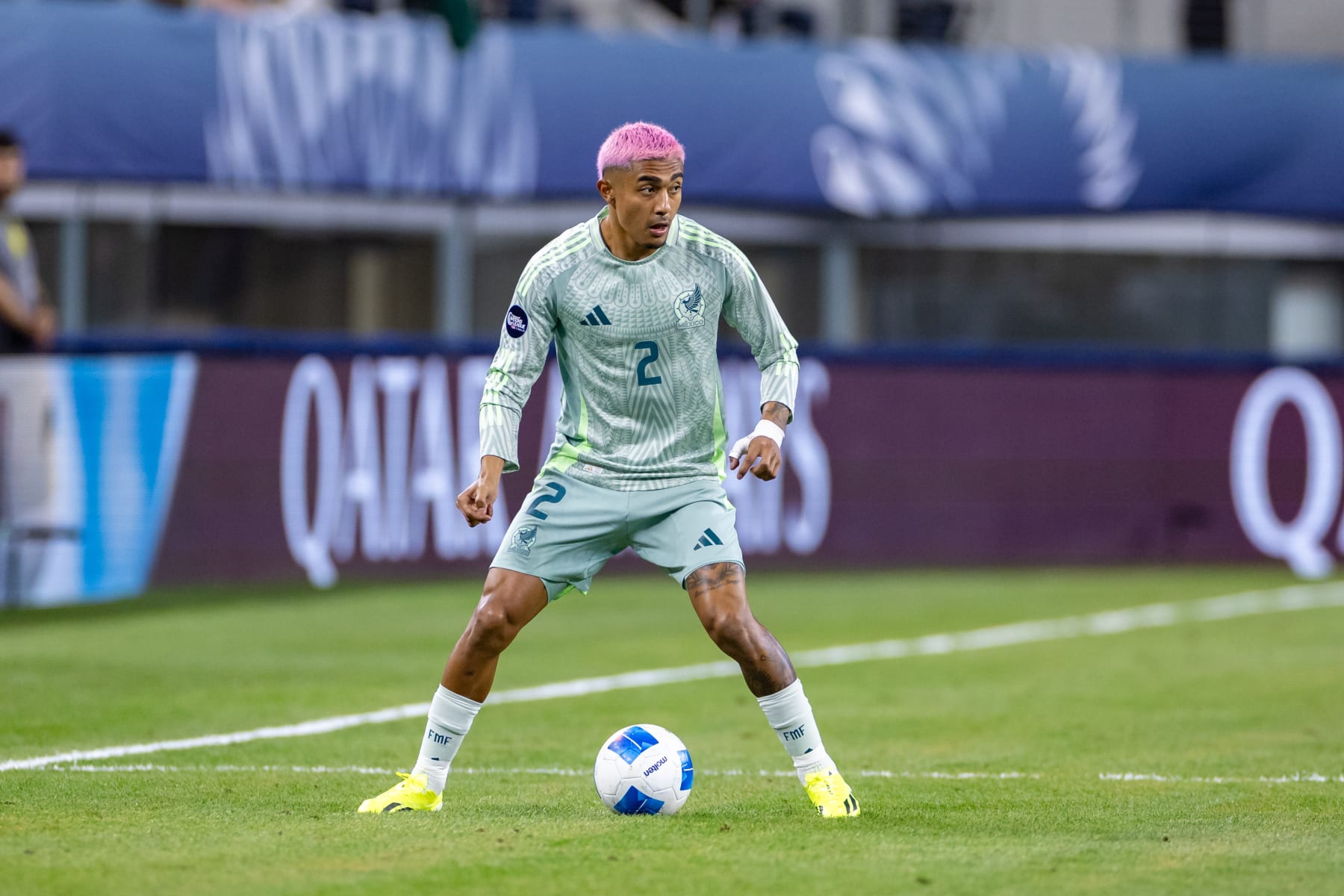 ARLINGTON, TX - MARCH 21: Mexico defender Julian Araujo (#2) dribbles up field during the Concacaf Nations League semi final match between Mexico and Panama on March 21, 2024 at AT&T Stadium in Arlington, Texas. (Photo by Matthew Visinsky/Icon Sportswire via Getty Images)