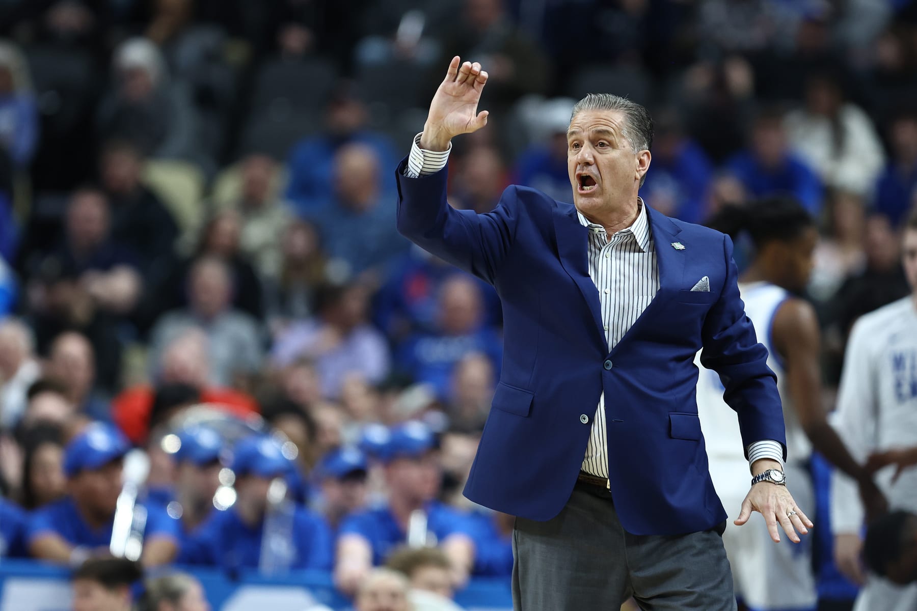 PITTSBURGH, PENNSYLVANIA - MARCH 21: Head coach John Calipari of the Kentucky Wildcats reacts during the first half of a game against the Oakland Golden Grizzlies in the first round of the NCAA Men's Basketball Tournament at PPG PAINTS Arena on March 21, 2024 in Pittsburgh, Pennsylvania. (Photo by Tim Nwachukwu/Getty Images)