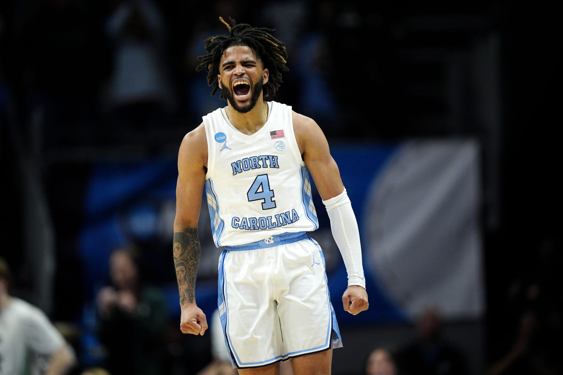 CHARLOTTE, NORTH CAROLINA - MARCH 23: RJ Davis #4 of the North Carolina Tar Heels celebrates a three-point basket during the first half against the Michigan State Spartans in the second round of the NCAA Men's Basketball Tournament at Spectrum Center on March 23, 2024 in Charlotte, North Carolina. (Photo by Jacob Kupferman/Getty Images)