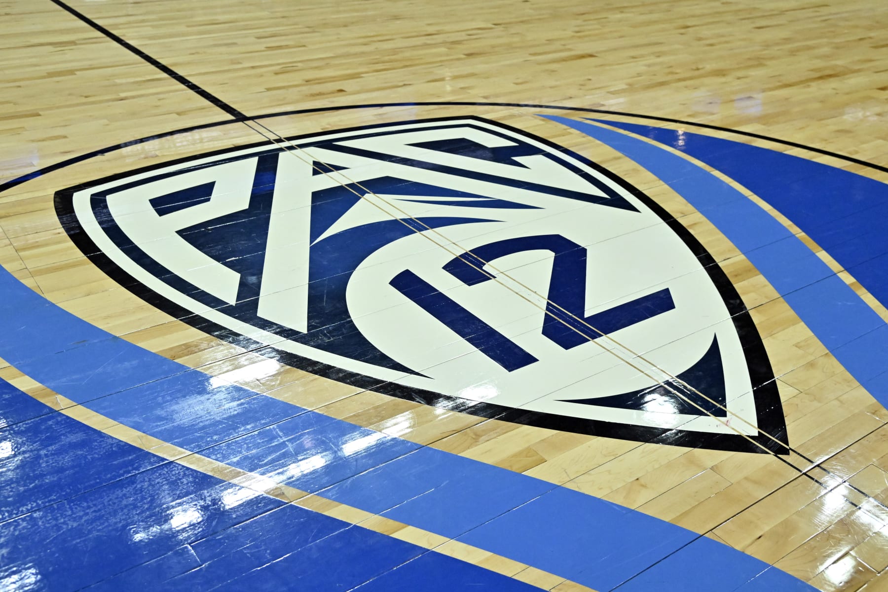 LAS VEGAS, NEVADA - MARCH 15: A Pac-12 tournament logo is shown on the court before a semifinal game between the Arizona Wildcats and the Oregon Ducks in the Pac-12 Conference basketball tournament at T-Mobile Arena on March 15, 2024 in Las Vegas, Nevada. (Photo by David Becker/Getty Images)