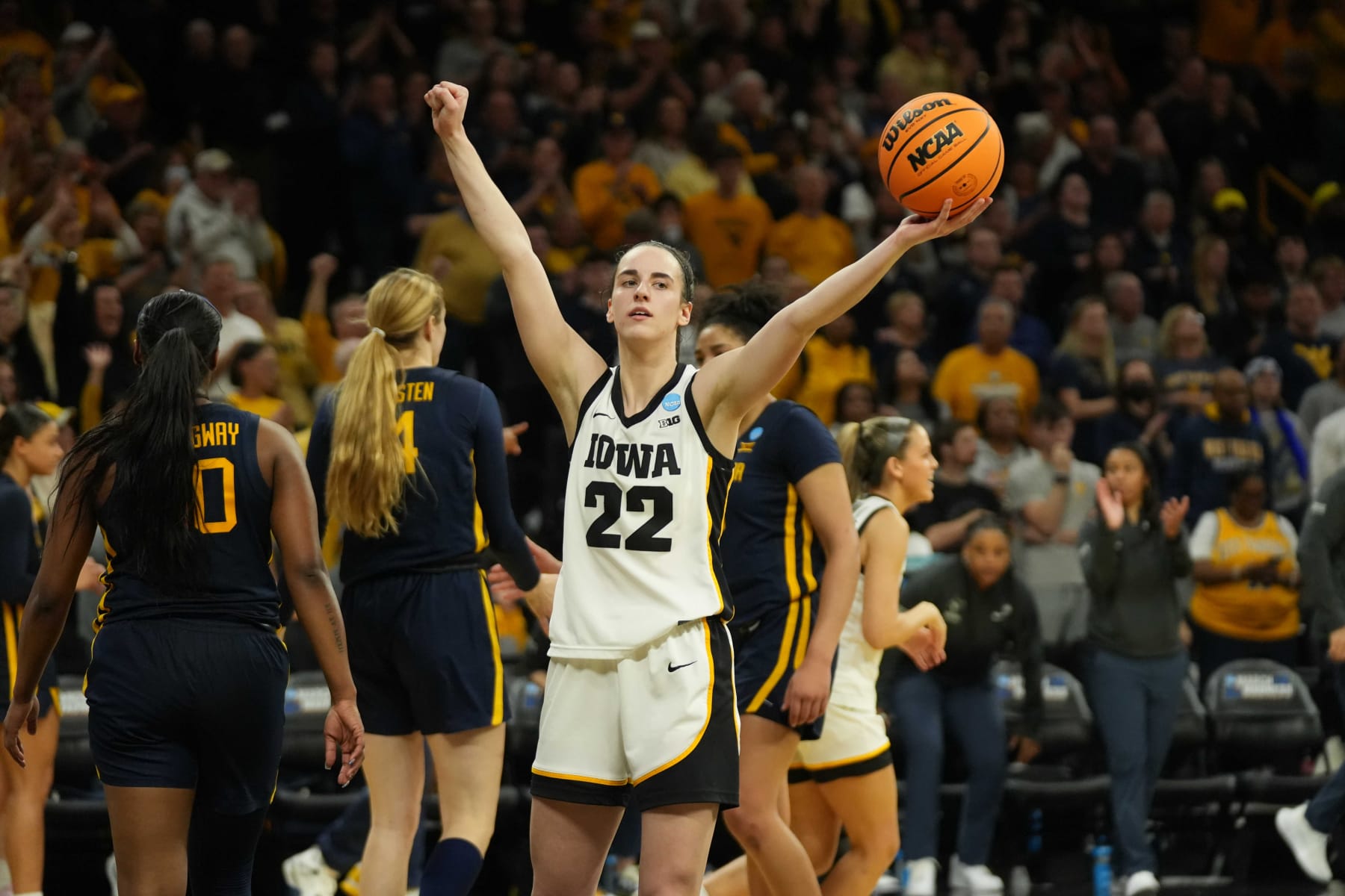 IOWA CITY, IOWA - MARCH 25: Caitlin Clark #22 of the Iowa Hawkeyes celebrates after the win against the West Virginia Mountaneers in the second round of the 2024 NCAA Women's Basketball Tournament held at Carver-Hawkeye Arena on March 25, 2024 in Iowa City, Iowa. (Photo by Bryon Houlgrave/NCAA Photos via Getty Images)