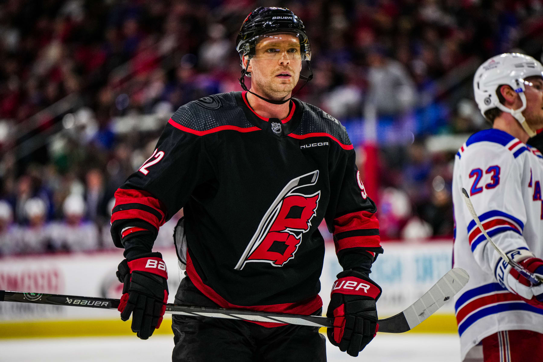 RALEIGH, NORTH CAROLINA - MARCH 12: Evgeny Kuznetsov #92 of the Carolina Hurricanes looks on during the second period against the New York Rangers at PNC Arena on March 12, 2024 in Raleigh, North Carolina. (Photo by Cato Cataldo/NHLI via Getty Images)