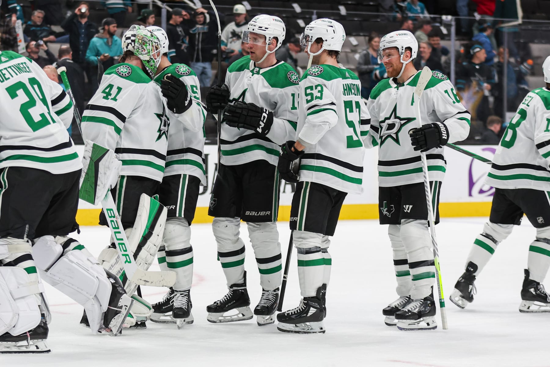 SAN JOSE, CAMARCH 26: Scott Wedgewood #41 of the Dallas Stars celebrates a win with Radek Faksa #12 at SAP Center on March 26, 2024 (Photo by Panayiota Good/San Jose Sharks)
