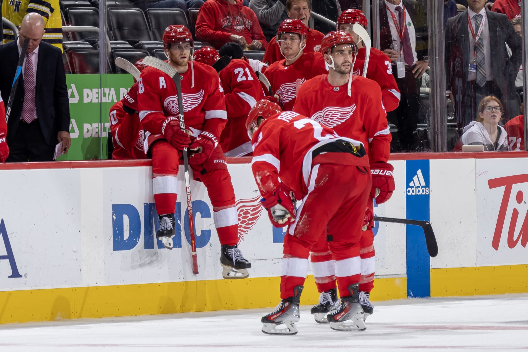 DETROIT, MI - OCTOBER 24: A dejected Lucas Raymond #23 of the Detroit Red Wings skates off the ice after loosing in O.T. to the Seattle Kraken at Little Caesars Arena on October 24, 2023 in Detroit, Michigan. Seattle defeated Detroit 5-4 in O.T. (Photo by Dave Reginek/NHLI via Getty Images)