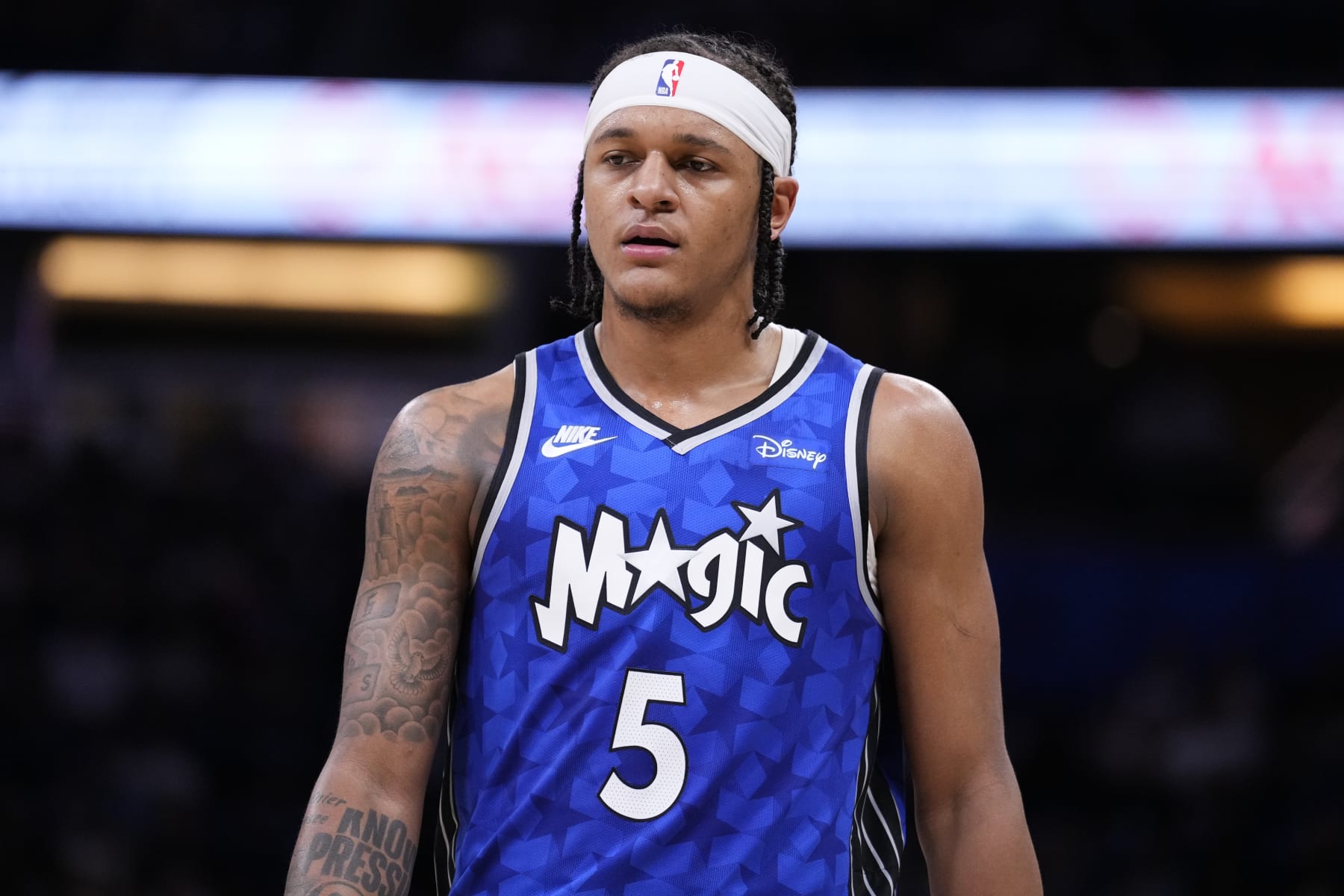 ORLANDO, FLORIDA - MARCH 23: Paolo Banchero #5 of the Orlando Magic looks on against the Sacramento Kings during the third quarter at Kia Center on March 23, 2024 in Orlando, Florida. NOTE TO USER: User expressly acknowledges and agrees that, by downloading and or using this photograph, User is consenting to the terms and conditions of the Getty Images License Agreement. (Photo by Rich Storry/Getty Images)