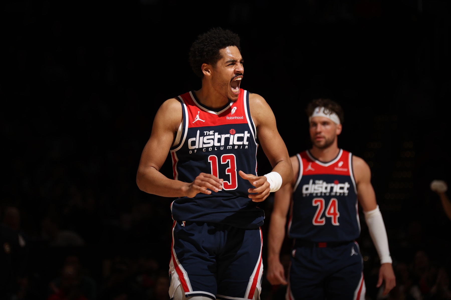 WASHINGTON, DC -  MARCH 23:  Jordan Poole #13 of the Washington Wizards celebrates during the game on March 23, 2024 at Capital One Arena in Washington, DC. NOTE TO USER: User expressly acknowledges and agrees that, by downloading and or using this Photograph, user is consenting to the terms and conditions of the Getty Images License Agreement. Mandatory Copyright Notice: Copyright 2024 NBAE (Photo by Stephen Gosling/NBAE via Getty Images)