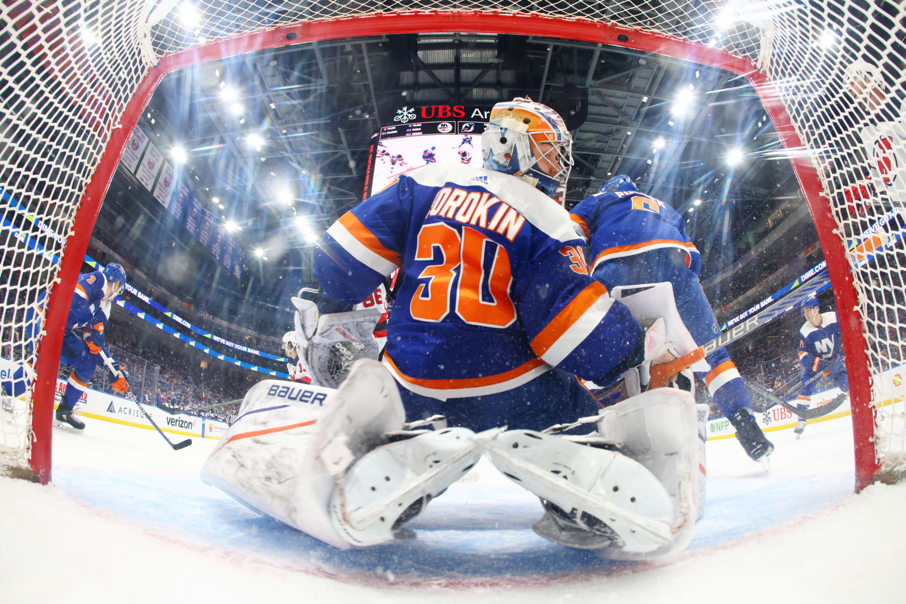 ELMONT, NEW YORK - MARCH 24: Ilya Sorokin #30 of the New York Islanders defends goal against the New Jersey Devils at UBS Arena on March 24, 2024 in Elmont, New York. (Photo by Mike Stobe/NHLI via Getty Images)