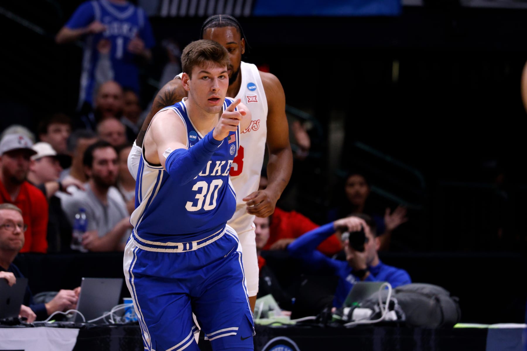 DALLAS, TEXAS - MARCH 29: Kyle Filipowski #30 of the Duke Blue Devils reacts following a three-point basket against the Houston Cougars during the first half in the Sweet 16 round of the NCAA Men's Basketball Tournament at American Airlines Center on March 29, 2024 in Dallas, Texas. (Photo by Lance King/Getty Images)