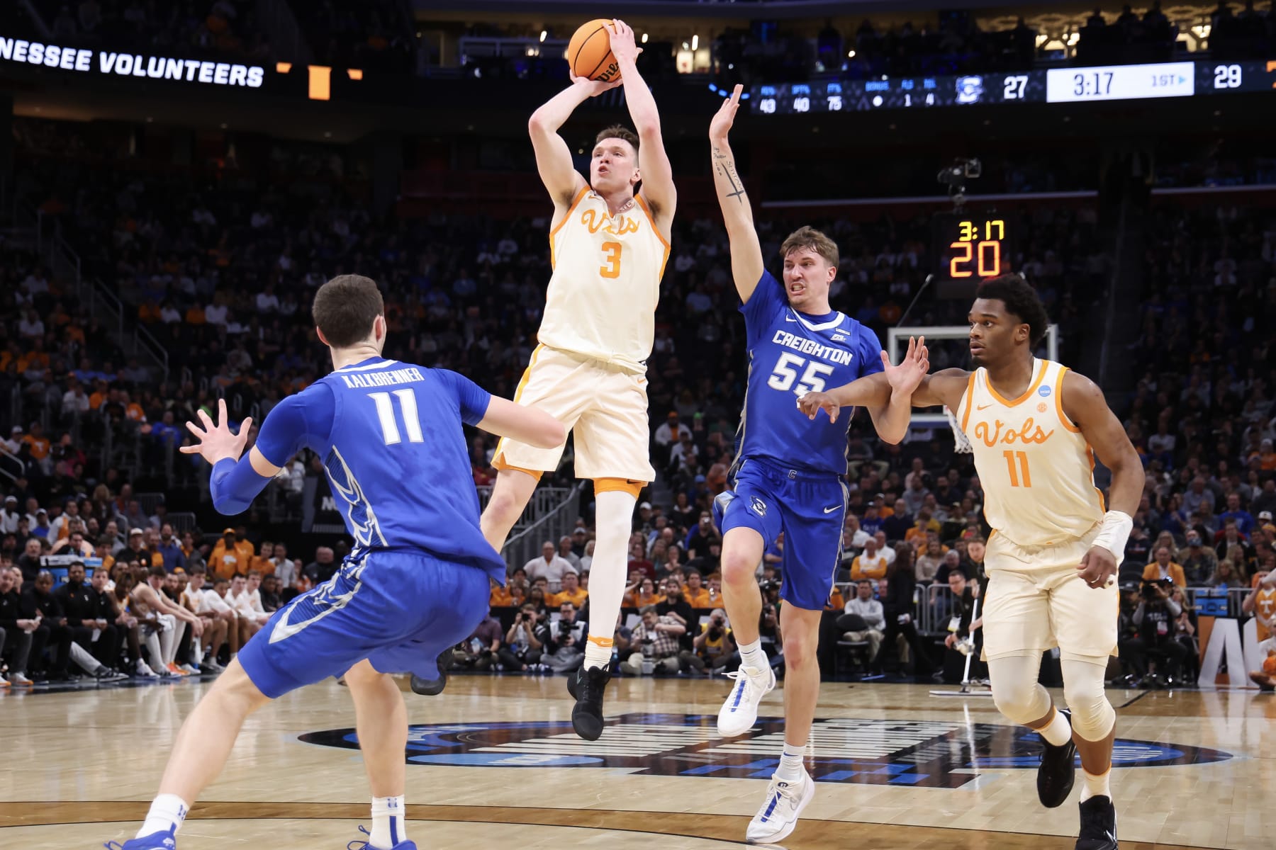 DETROIT, MICHIGAN - MARCH 29: Dalton Knecht #3 of the Tennessee Volunteers shoots the ball during the first half against Baylor Scheierman #55 of the Creighton Bluejays in the Sweet 16 round of the NCAA Men's Basketball Tournament at Little Caesars Arena on March 29, 2024 in Detroit, Michigan. (Photo by Gregory Shamus/Getty Images)