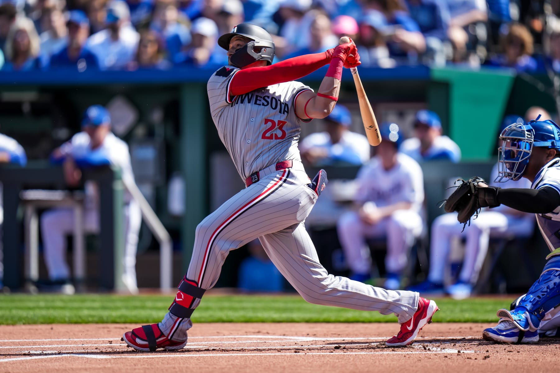 KANSAS CITY, MO - MARCH 28: Royce Lewis #23 of the Minnesota Twins bats and hits a home run against the Kansas City Royals on March 28, 2024 at Kauffman Stadium in Kansas City, Missouri. (Photo by Brace Hemmelgarn/Minnesota Twins/Getty Images)