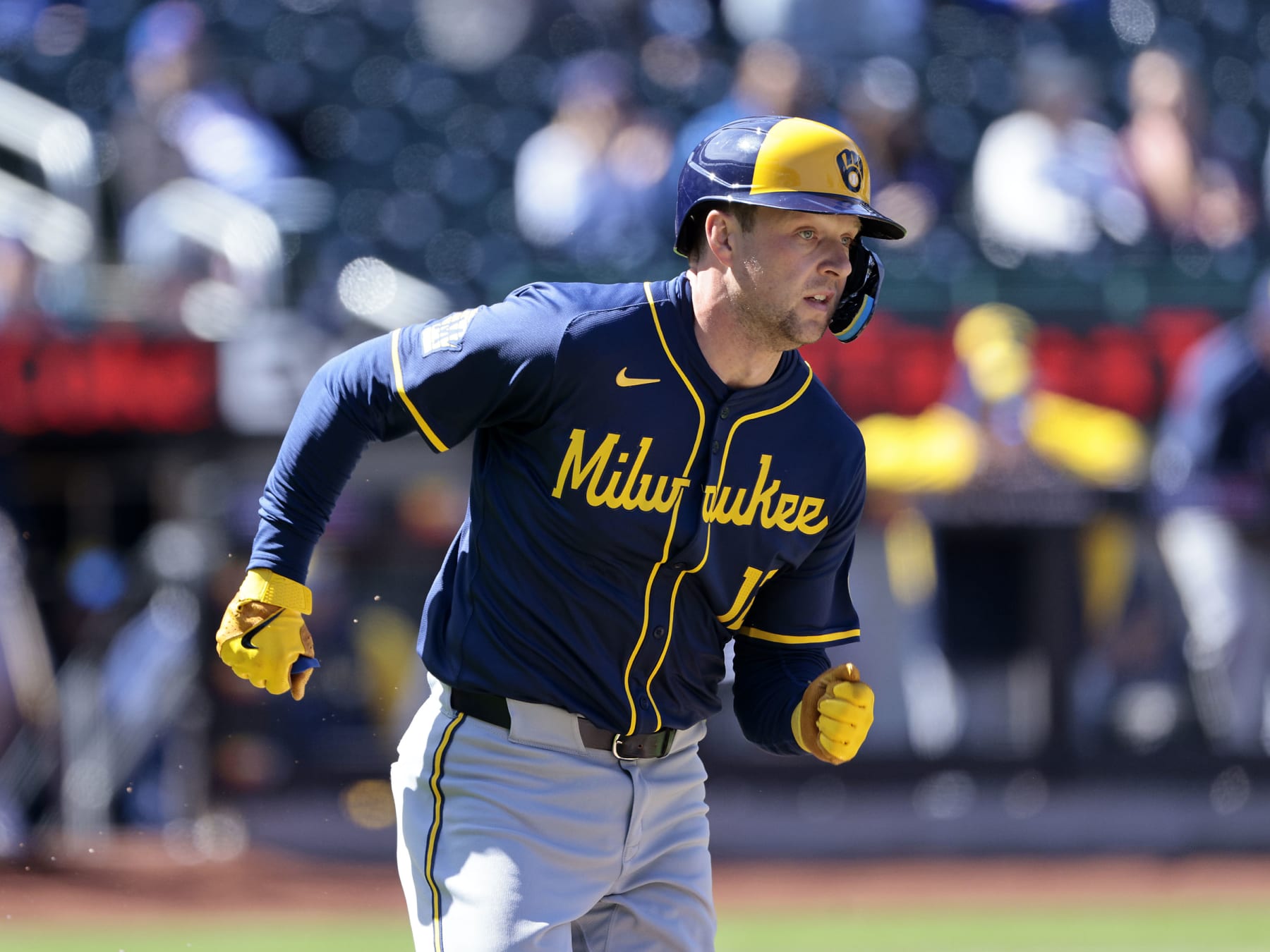 NEW YORK, NEW YORK - MARCH 30: Rhys Hoskins #12 of the Milwaukee Brewers runs up the first base line after connecting for a two run RBI single in the top of the first inning against the New York Mets at Citi Field on March 30, 2024 in New York City. (Photo by Christopher Pasatieri/Getty Images)