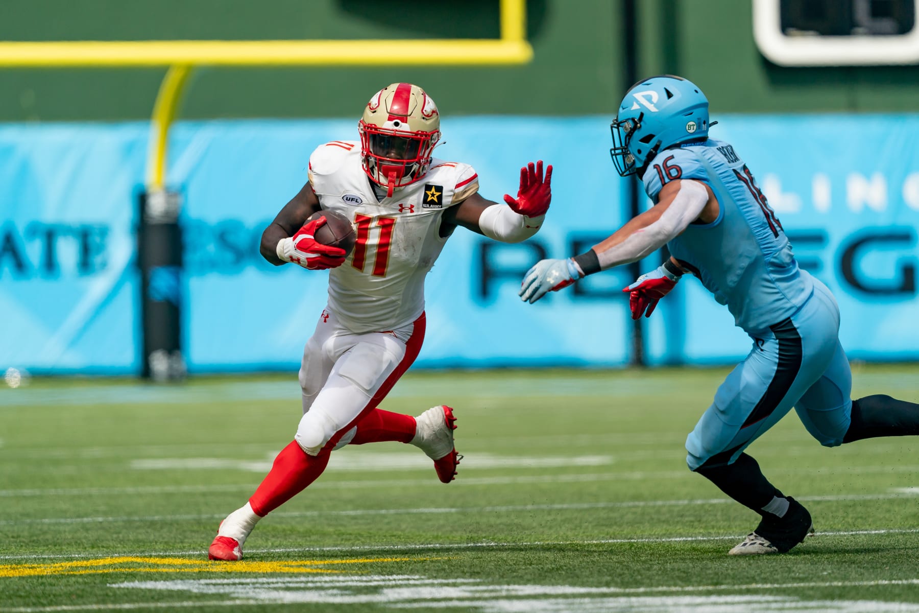 ARLINGTON, TX - MARCH 30: Birmingham Stallions running back C.J. Marable (11) tries to stiff arm Arlington Renegades linebacker Storey Jackson (16) during a UFL game between the Birmingham Stallions and the Arlington Renegades on March 30, 2024 at Choctaw Stadium in Arlington, TX. (Photo by Chris Leduc/Icon Sportswire via Getty Images)