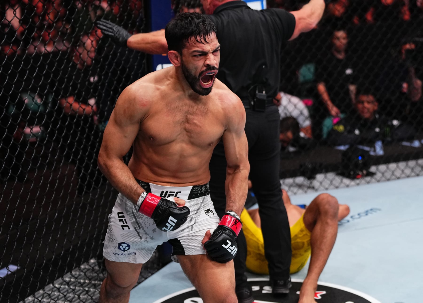 ATLANTIC CITY, NEW JERSEY - MARCH 30: Julio Arce reacts after his TKO victory against Herbert Burns of Brazil in a featherweight bout during the UFC Fight Night event at Boardwalk Hall Arena on March 30, 2024 in Atlantic City, New Jersey. (Photo by Jeff Bottari/Zuffa LLC via Getty Images)