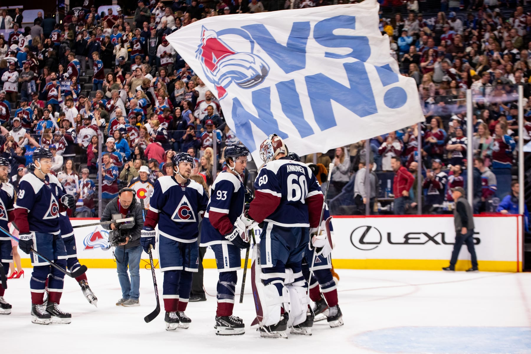 DENVER, COLORADO - MARCH 30: The Colorado Avalanche line up to hug goaltender Justus Annunen #60 after the team defeated the Nashville Predators 7-4 at Ball Arena on March 30, 2024 in Denver, Colorado. (Photo by Ashley Potts/NHLI via Getty Images)