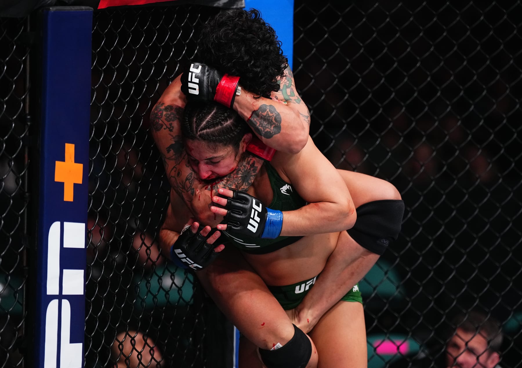 ATLANTIC CITY, NEW JERSEY - MARCH 30: (L-R) Virna Jandiroba of Brazil works for a submission against Loopy Godinez of Mexico in a strawweight bout during the UFC Fight Night event at Boardwalk Hall Arena on March 30, 2024 in Atlantic City, New Jersey. (Photo by Jeff Bottari/Zuffa LLC via Getty Images)