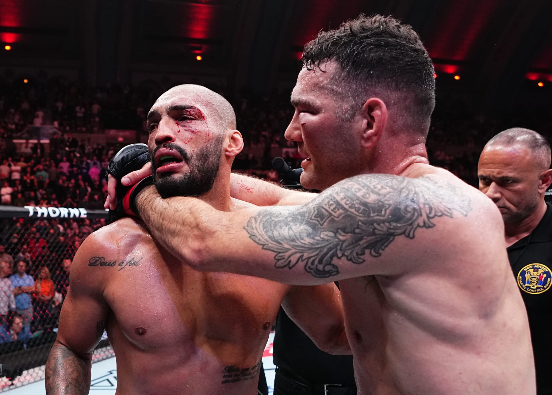ATLANTIC CITY, NEW JERSEY - MARCH 30: (R-L) Chris Weidman talks with Bruno Silva of Brazil after their middleweight bout during the UFC Fight Night event at Boardwalk Hall Arena on March 30, 2024 in Atlantic City, New Jersey. (Photo by Jeff Bottari/Zuffa LLC via Getty Images)