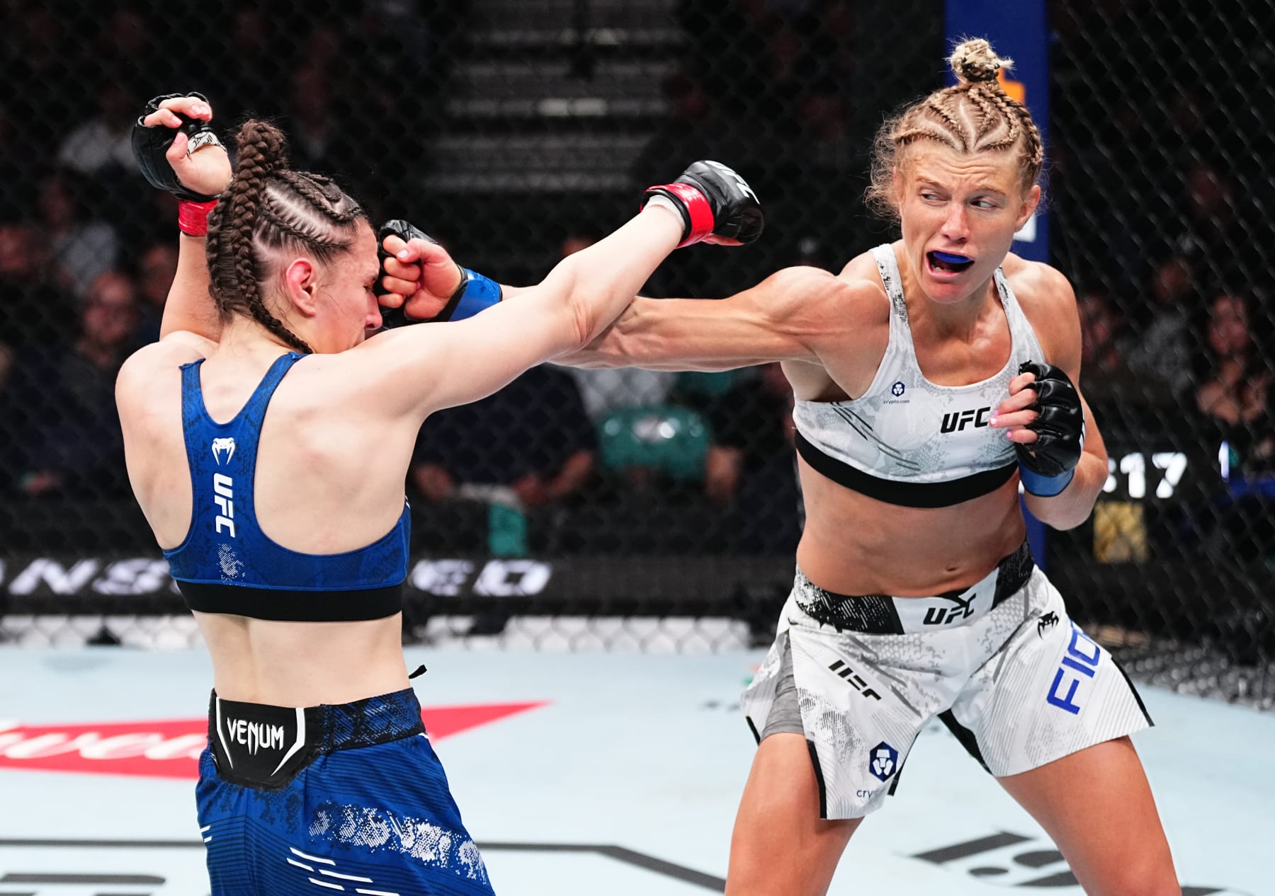 ATLANTIC CITY, NEW JERSEY - MARCH 30: (R-L) Manon Fiorot of France punches Erin Blanchfield in a flyweight bout during the UFC Fight Night event at Boardwalk Hall Arena on March 30, 2024 in Atlantic City, New Jersey. (Photo by Jeff Bottari/Zuffa LLC via Getty Images)