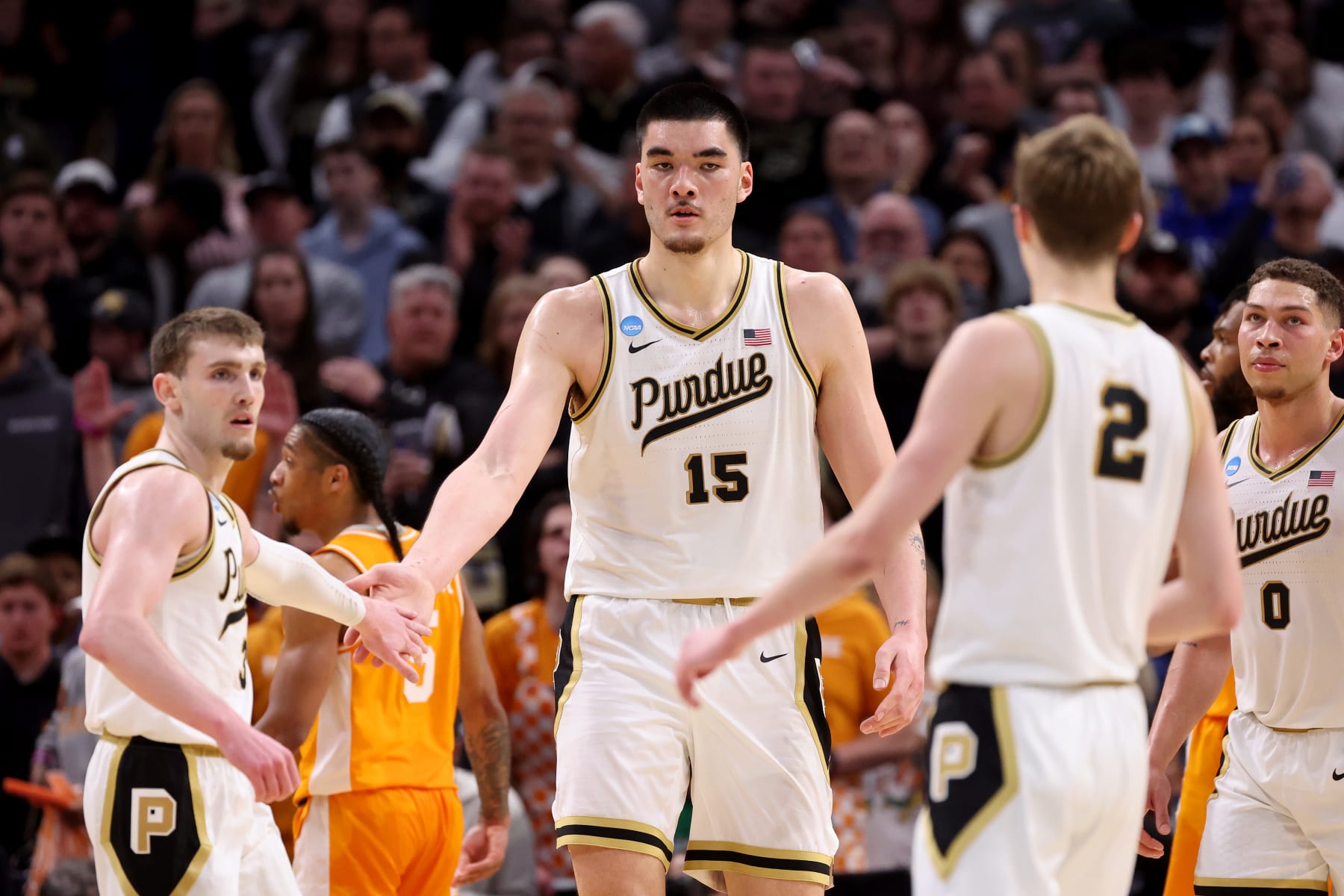 DETROIT, MICHIGAN - MARCH 31: Zach Edey #15 of the Purdue Boilermakers high fives Braden Smith #3 against the Tennessee Volunteers during the first half in the Elite 8 round of the NCAA Men's Basketball Tournament at Little Caesars Arena on March 31, 2024 in Detroit, Michigan. (Photo by Gregory Shamus/Getty Images)