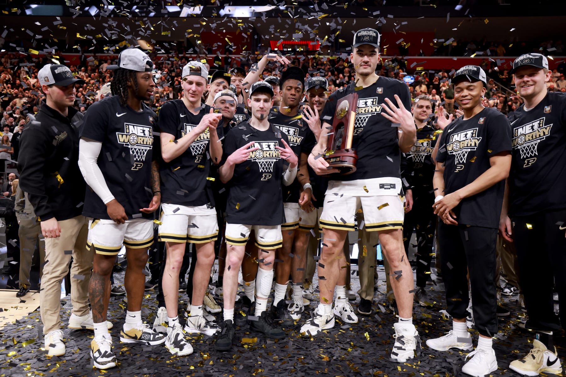DETROIT, MICHIGAN - MARCH 31: Zach Edey #15 of the Purdue Boilermakers celebrates with his teammates after defeating the Tennessee Volunteers in the Elite 8 round of the NCAA Men's Basketball Tournament at Little Caesars Arena on March 31, 2024 in Detroit, Michigan. (Photo by Gregory Shamus/Getty Images)