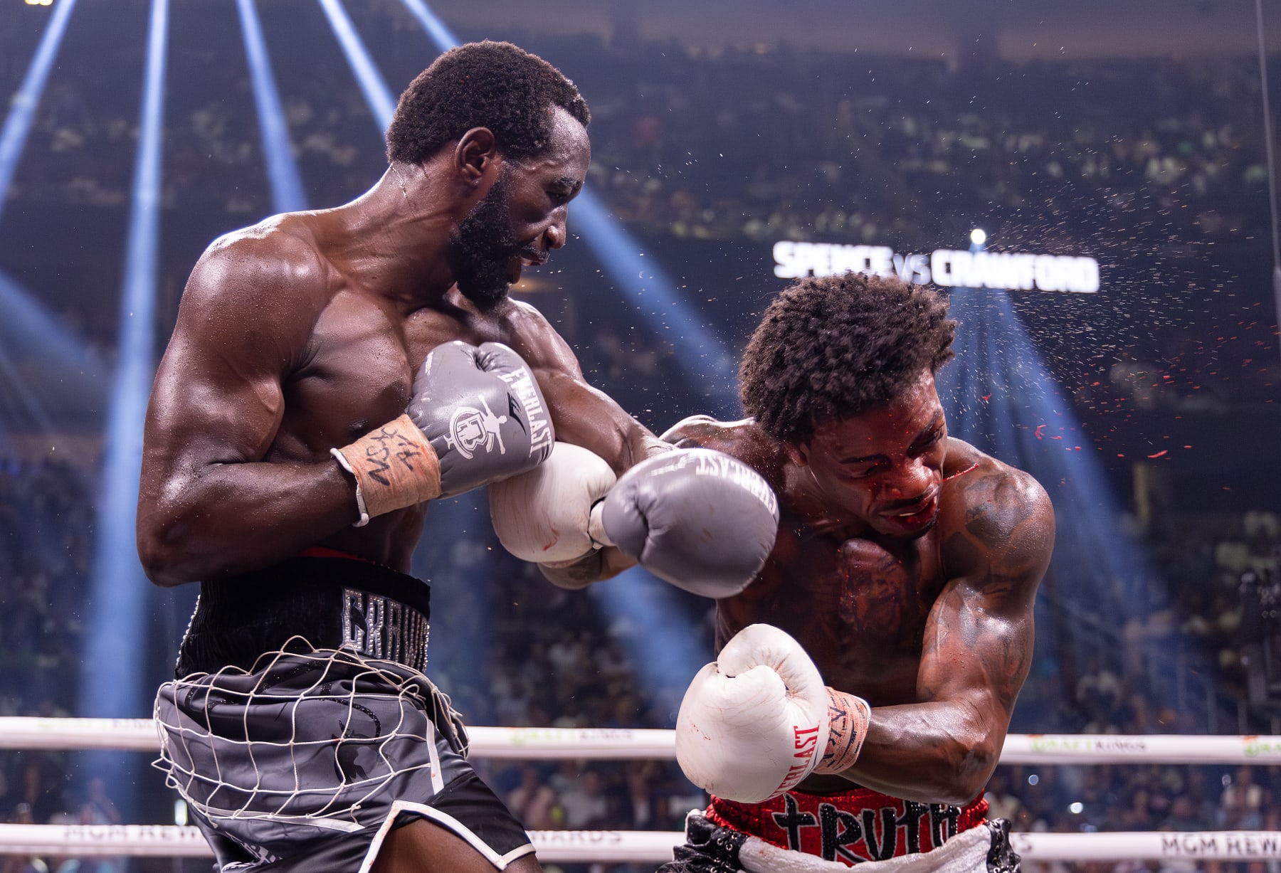 LAS VEGAS, NEVADA - JULY 29: Terence Crawford punches Errol Spence Jr. during round 7 of their World Welterweight Championship bout at T-Mobile Arena on July 29, 2023 in Las Vegas, Nevada. (Photo by Al Bello/Getty Images)