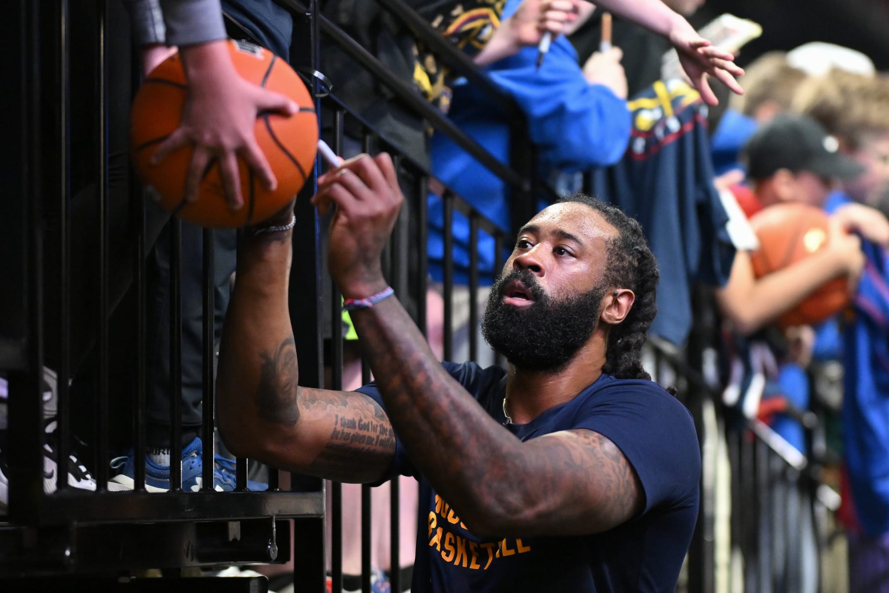 PORTLAND, OREGON - MARCH 23: DeAndre Jordan #6 of the Denver Nuggets signs autographs before the game against the Portland Trail Blazers at the Moda Center on March 23, 2024 in Portland, Oregon. NOTE TO USER: User expressly acknowledges and agrees that, by downloading and or using this photograph, User is consenting to the terms and conditions of the Getty Images License Agreement. (Photo by Alika Jenner/Getty Images)