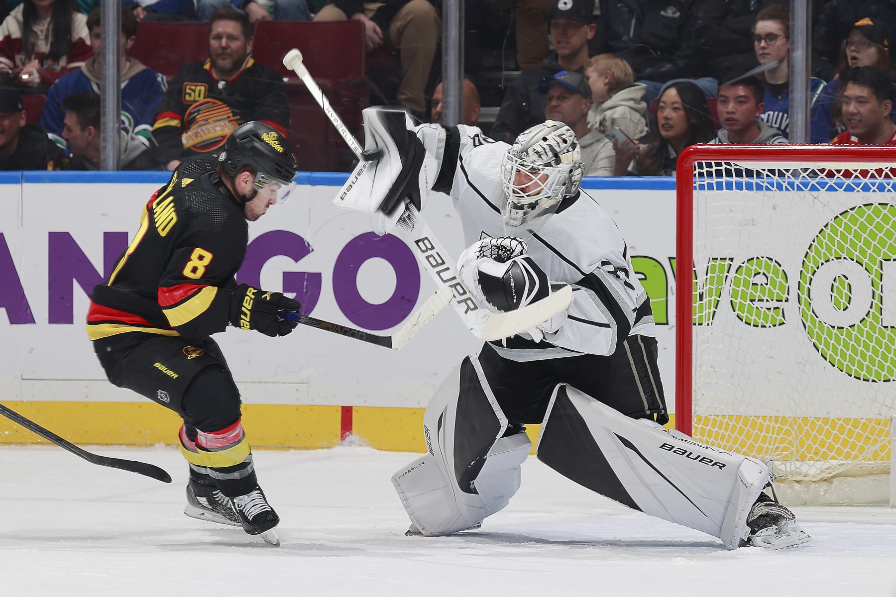 VANCOUVER, CANADA - MARCH 25: Conor Garland #8 of the Vancouver Canucks looks on as Cam Talbot #39 of the Los Angeles Kings makes a save during their NHL game at Rogers Arena on March 25, 2024 in Vancouver, British Columbia, Canada. (Photo by Jeff Vinnick/NHLI via Getty Images)