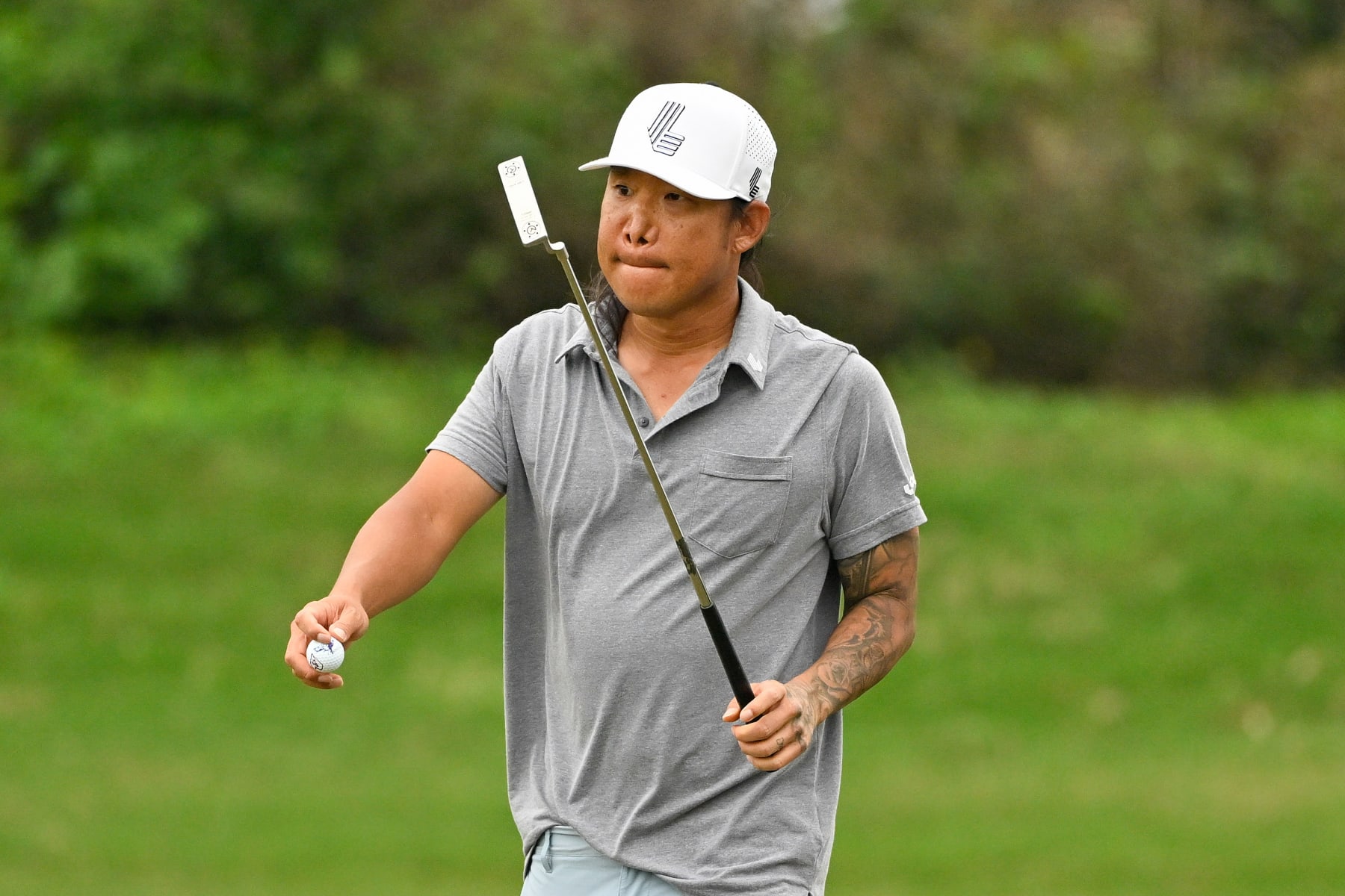 MACAU, CHINA - MARCH 15: Anthony Kim of the United States reacts after putting on hole 3 during the second round of International Series Macau at Macau Golf and Country Club on March 15, 2024 in Macau, China.  (Photo by Jason Butler/Getty Images)