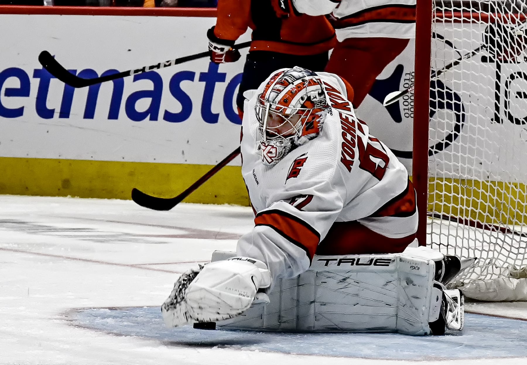 WASHINGTON, DC - MARCH 22: Carolina Hurricanes goaltender Pyotr Kochetkov (52) makes a save during the Carolina Hurricanes game versus the Washington Capitals on March 22, 2024 at the Capital One Arena in Washington, D.C. (Photo by Mark Goldman/Icon Sportswire via Getty Images)