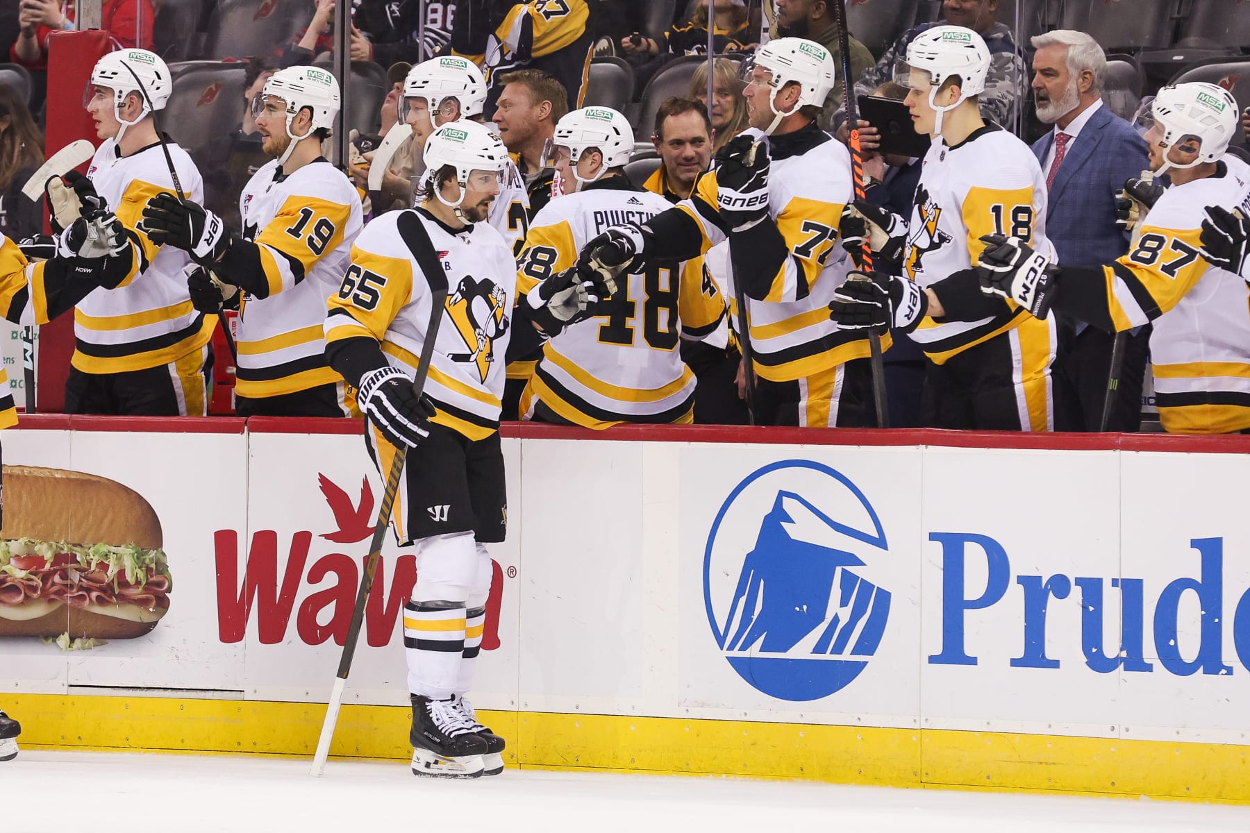 NEWARK, NJ - APRIL 02: Pittsburgh Penguins defenseman Erik Karlsson (65) celebrates after scoring a goal during a game between the Pittsburgh Penguins and New Jersey Devils on April 2, 2024 at Prudential Center in the Newark, New Jersey. (Photo by Andrew Mordzynski/Icon Sportswire via Getty Images)