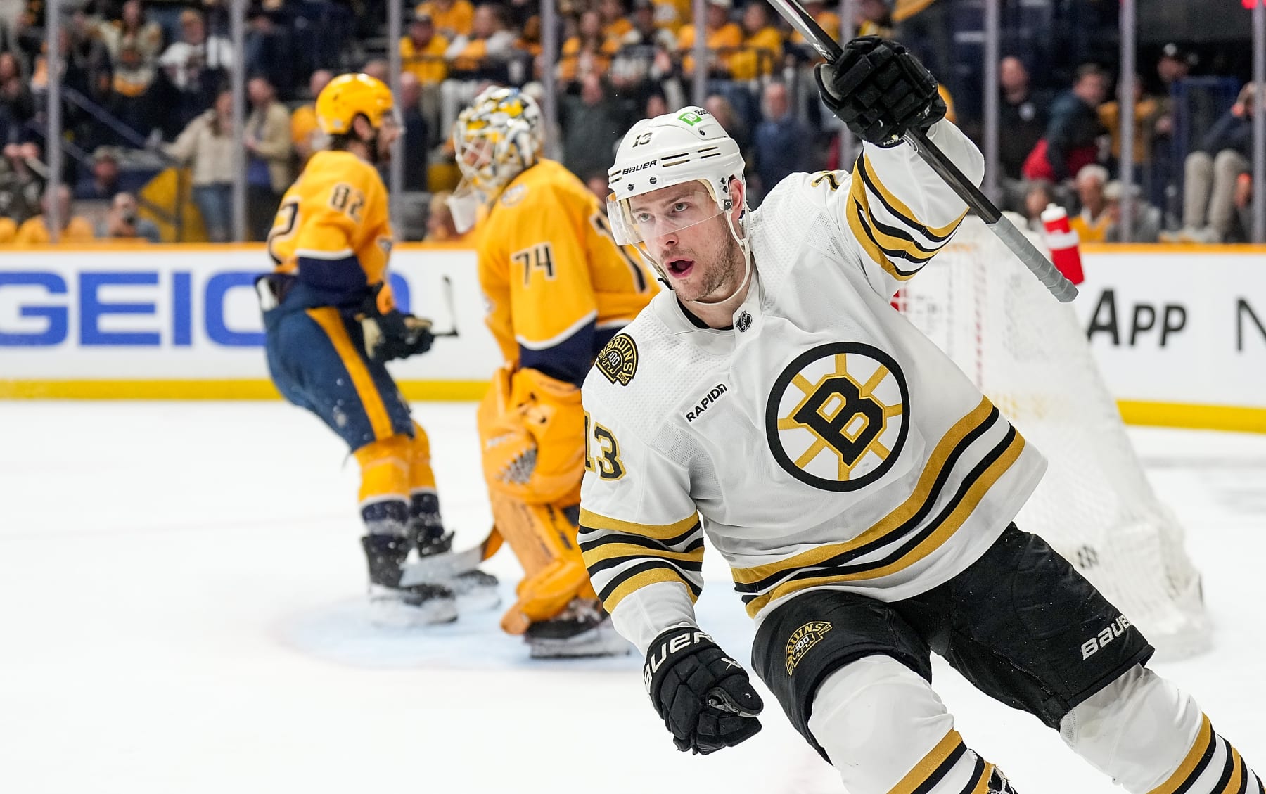 NASHVILLE, TENNESSEE - APRIL 2: Charlie Coyle #13 of the Boston Bruins celebrates his goal against the Nashville Predators during an NHL game at Bridgestone Arena on April 2, 2024 in Nashville, Tennessee. (Photo by John Russell/NHLI via Getty Images)
