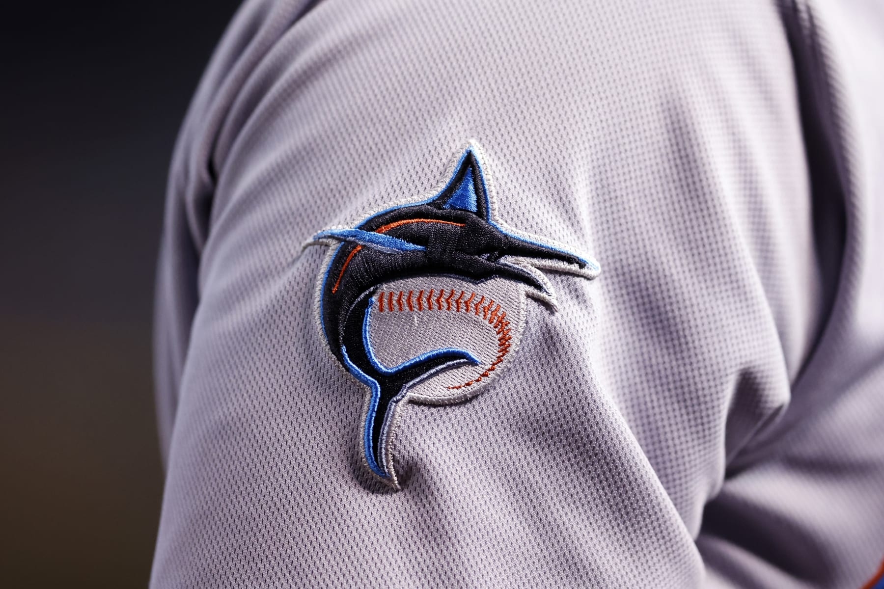 PHOENIX, ARIZONA - MAY 10: A close up of the Miami Marlins logo patch on a uniform during the game against the Arizona Diamondbacks at Chase Field on May 10, 2023 in Phoenix, Arizona. The Marlins defeated the Diamondbacks 5-4. (Photo by Chris Coduto/Getty Images)