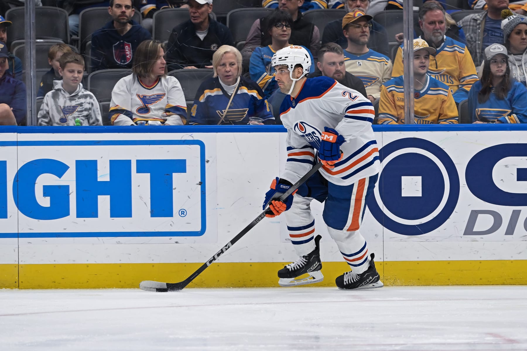 ST. LOUIS, MO - April 01: Edmonton Oilers defenseman Evan Bouchard (2) skates the puck out of his own zone during a regular season game between the Edmonton Oilers and the St. Louis Blues on April 01, 2024, at the Enterprise Center in St. Louis MO (Photo by Rick Ulreich/Icon Sportswire via Getty Images)