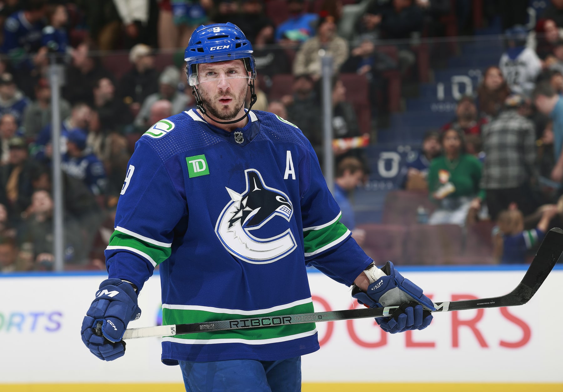 VANCOUVER, CANADA - JANUARY 18: J.T. Miller #9 of the Vancouver Canucks skates up ice during their NHL game against the Arizona Coyotes at Rogers Arena on January 18, 2024 in Vancouver, British Columbia, Canada. (Photo by Jeff Vinnick/NHLI via Getty Images)