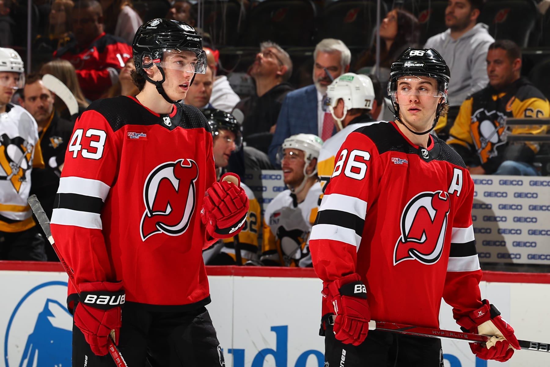 NEWARK, NJ - APRIL 02: Jack Hughes #86 of the New Jersey Devils and Luke Hughes #43 during the third period of the game against the Pittsburgh Penguins at the Prudential Center on April 2, 2024 in Newark, New Jersey. (Photo by Rich Graessle/NHLI via Getty Images)