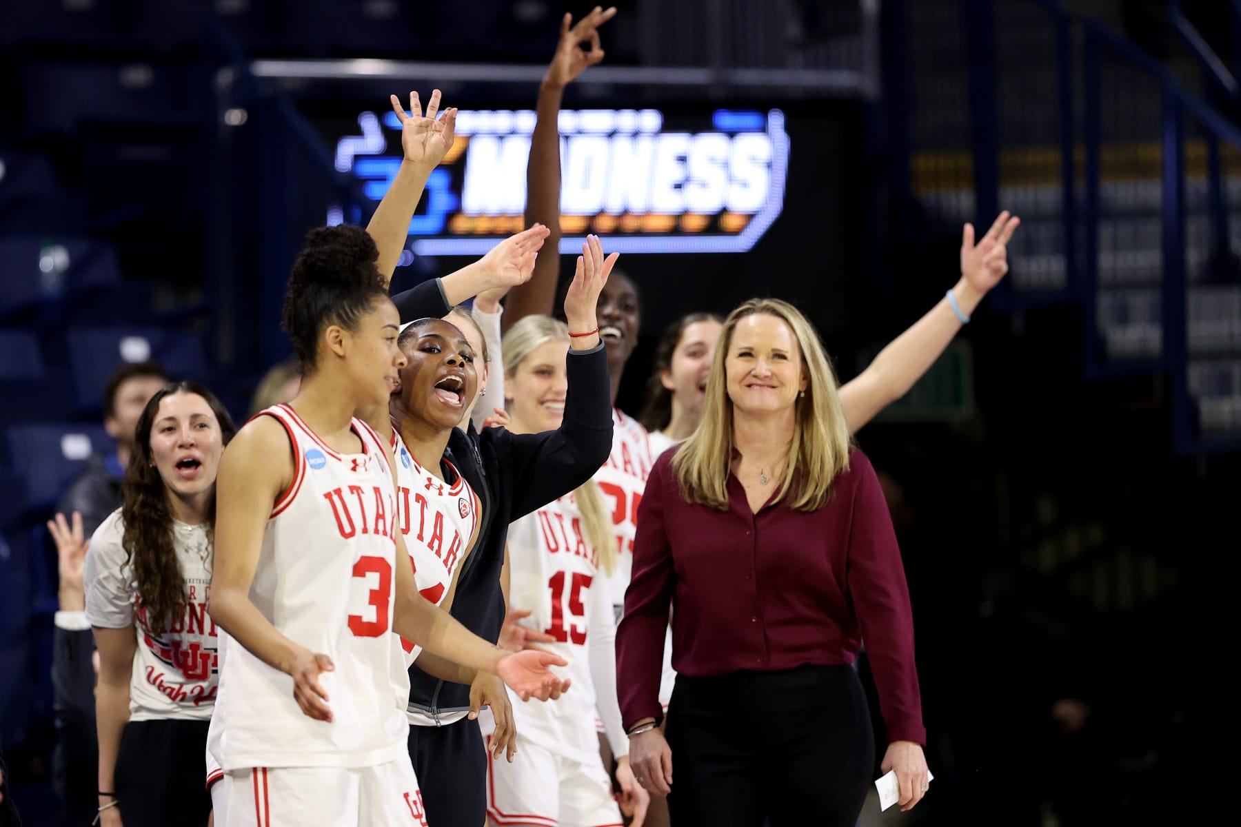 SPOKANE, WASHINGTON - MARCH 23: The Utah Utes celebrate after a basket against the South Dakota State Jackrabbits in the first round of the NCAA Women's Basketball Tournament at McCarthey Athletic Center on March 23, 2024 in Spokane, Washington. (Photo by Steph Chambers/Getty Images)