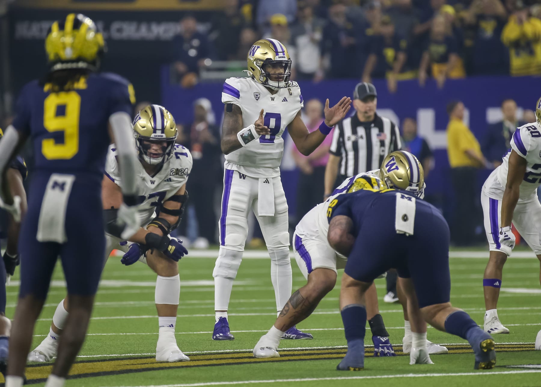 HOUSTON, TX - JANUARY 08: Washington Huskies quarterback Michael Penix Jr. (9) calls out a play in the first quarter during the CFP National Championship game between the Michigan Wolverines and Washington Huskies on January 8, 2024 at NRG Stadium in Houston, Texas. (Photo by Leslie Plaza Johnson/Icon Sportswire via Getty Images)