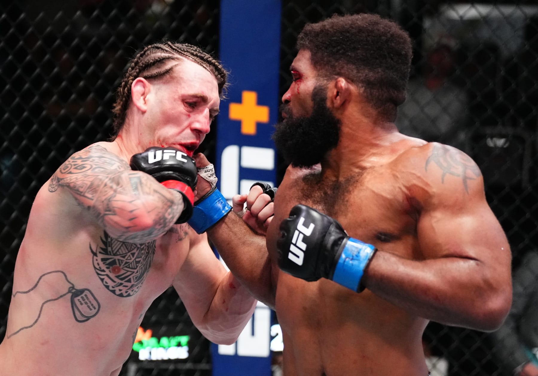 LAS VEGAS, NEVADA - APRIL 06: (R-L) Chris Curtis punches Brendan Allen in a middleweight fight during the UFC Fight Night event at UFC APEX on April 06, 2024 in Las Vegas, Nevada. (Photo by Jeff Bottari/Zuffa LLC via Getty Images)