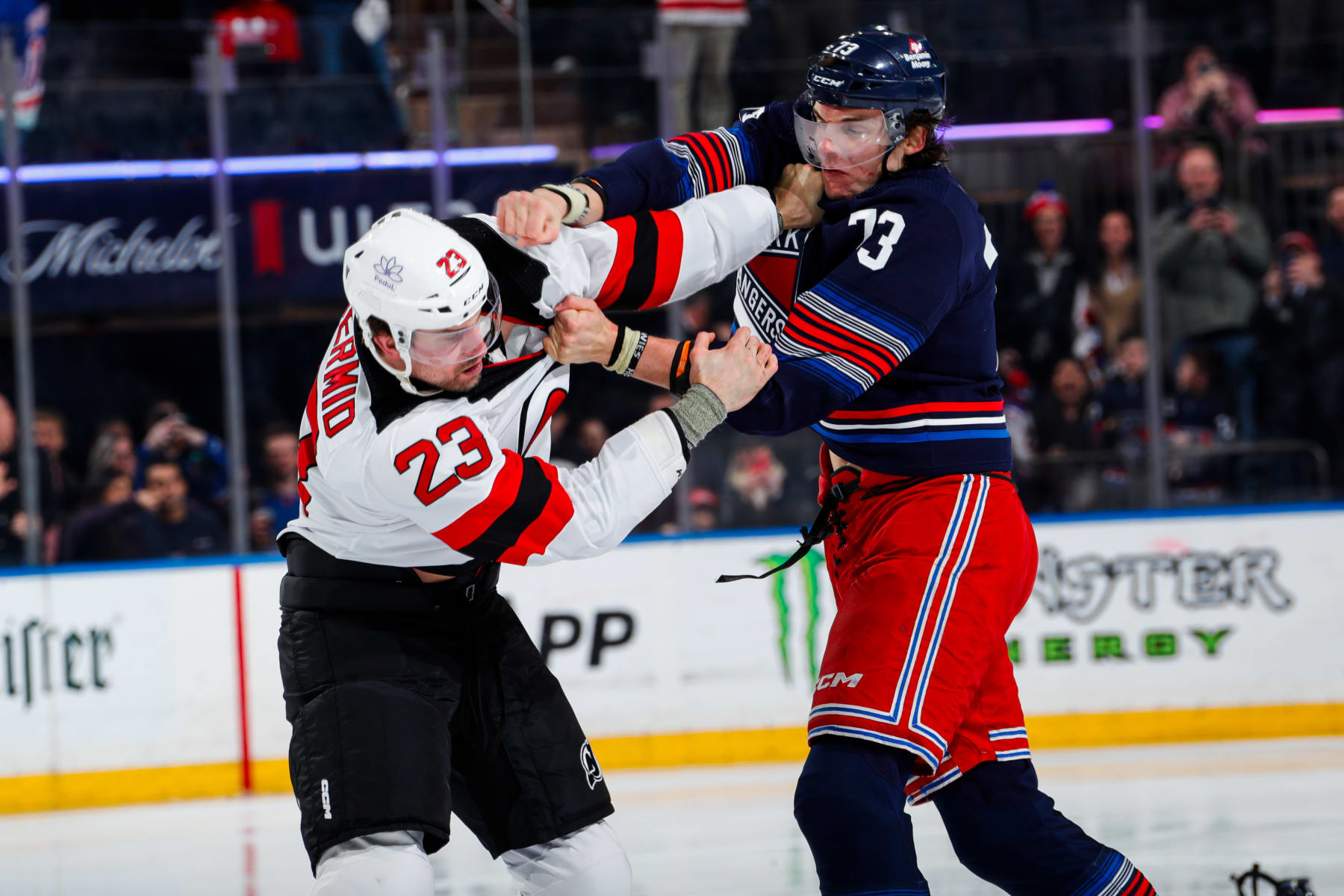 NEW YORK, NEW YORK - APRIL 03: Matt Rempe #73 of the New York Rangers fights Kurtis MacDermid #23 of the New Jersey Devils at Madison Square Garden on April 3, 2024 in New York City. (Photo by Jared Silber/NHLI via Getty Images)