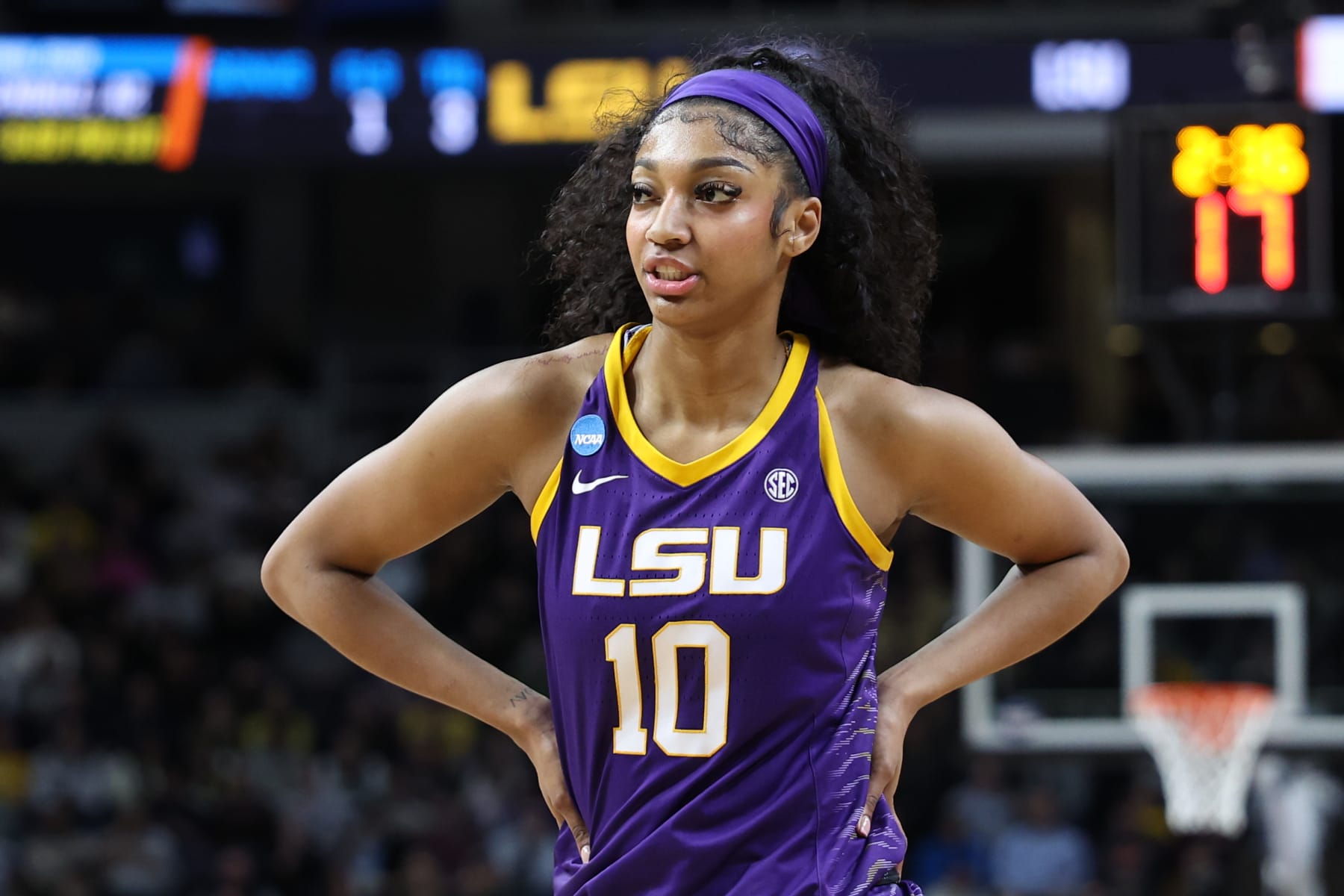 ALBANY, NEW YORK - APRIL 01: Angel Reese #10 of the LSU Lady Tigers reacts in the first half against the Iowa Hawkeyes during the Elite Eight round of the 2024 NCAA Women's Basketball Tournament held at MVP Arena on April 1, 2024 in Albany, New York. (Photo by Scott Taetsch/NCAA Photos via Getty Images)