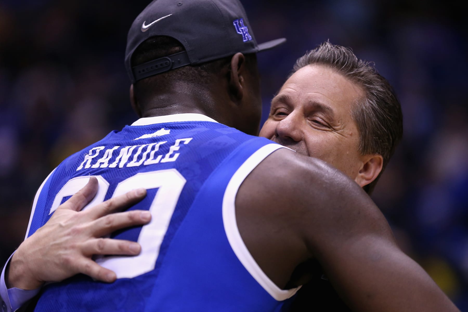 INDIANAPOLIS, IN - MARCH 30:  head coach John Calipari of the Kentucky Wildcats celebrates with Julius Randle #30 after defeating the Michigan Wolverines 75 to 72 in the midwest regional final of the 2014 NCAA Men's Basketball Tournament at Lucas Oil Stadium on March 30, 2014 in Indianapolis, Indiana.  (Photo by Jonathan Daniel/Getty Images)
