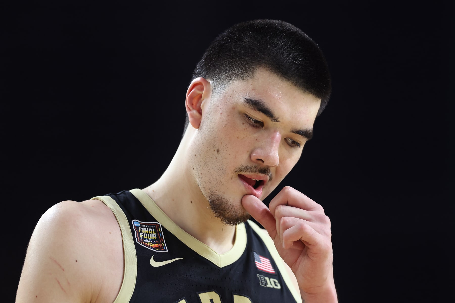 GLENDALE, ARIZONA - APRIL 08: Zach Edey #15 of the Purdue Boilermakers walks across the court in the second half against the Connecticut Huskies during the NCAA Men's Basketball Tournament National Championship game at State Farm Stadium on April 08, 2024 in Glendale, Arizona. (Photo by Christian Petersen/Getty Images)