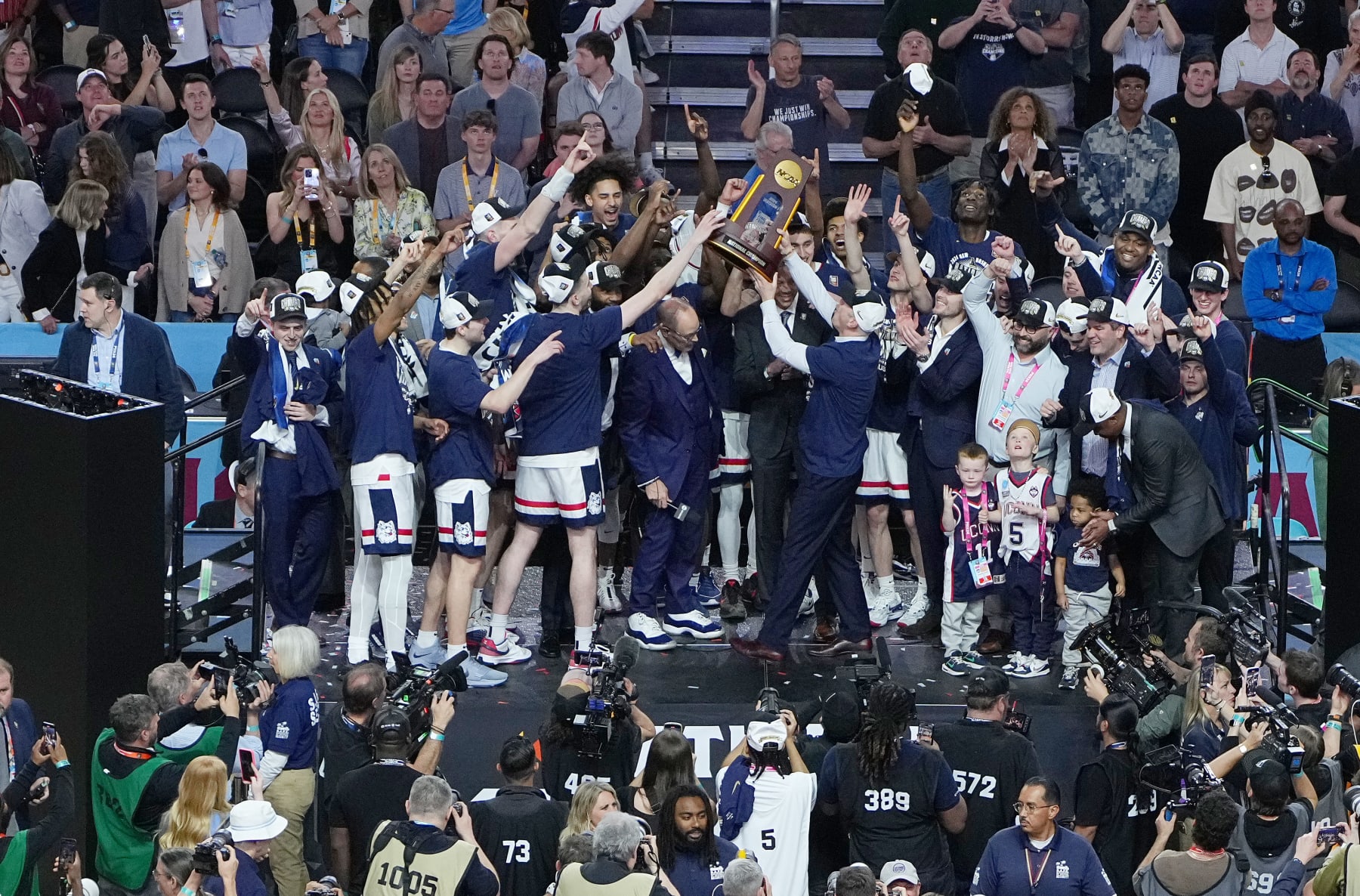 GLENDALE, ARIZONA - APRIL 08: Connecticut Huskies celebrate after defeating the Purdue Boilermakers in the NCAA Men's Basketball Tournament National Championship game at State Farm Stadium on April 08, 2024 in Glendale, Arizona. (Photo by Jack Dempsey/NCAA Photos via Getty Images)