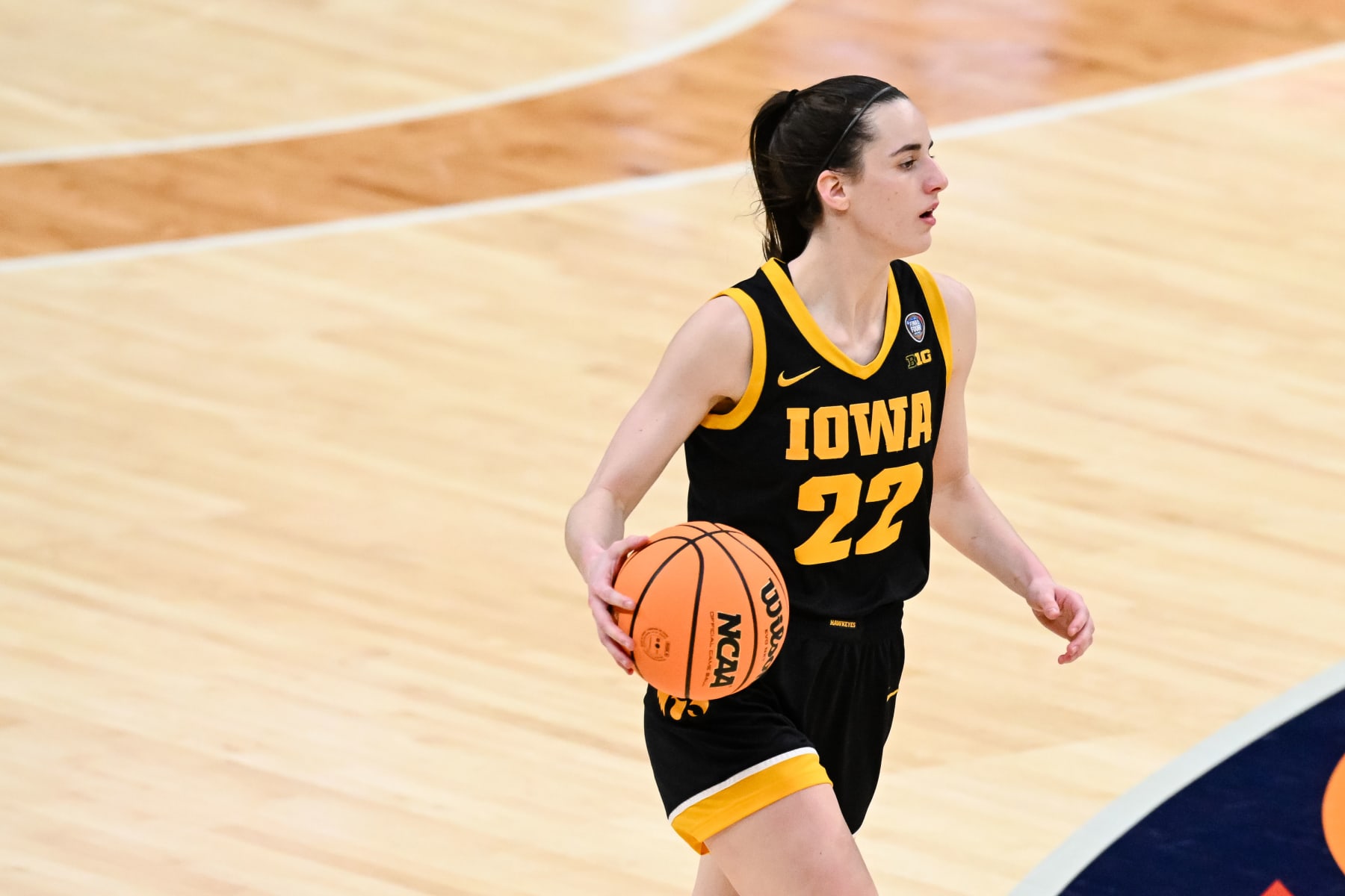 CLEVELAND, OH - APRIL 7: Caitlin Clark #22 of the Iowa Hawkeyes dribbles the ball during the second half at the 2024 NCAA Women's Basketball Tournament championship game between Iowa and South Carolina at Rocket Mortgage FieldHouse on April 7, 2024 in Cleveland, Ohio. (Photo by Thien-An Truong/ISI Photos/Getty Images)