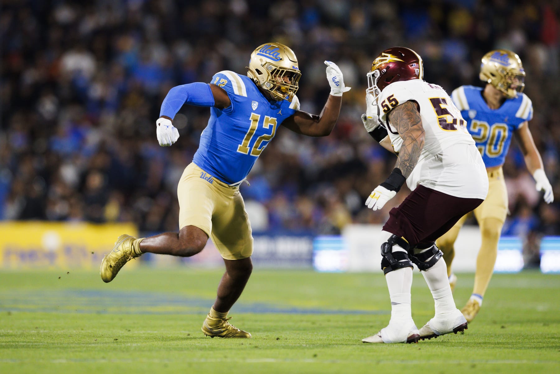 PASADENA, CA - NOVEMBER 11: UCLA Bruins defensive lineman Grayson Murphy (12) rushes the edge during a college football game against the Arizona State Sun Devils on November 11, 2023 at Rose Bowl Stadium in Pasadena, CA. (Photo by Ric Tapia/Icon Sportswire via Getty Images)