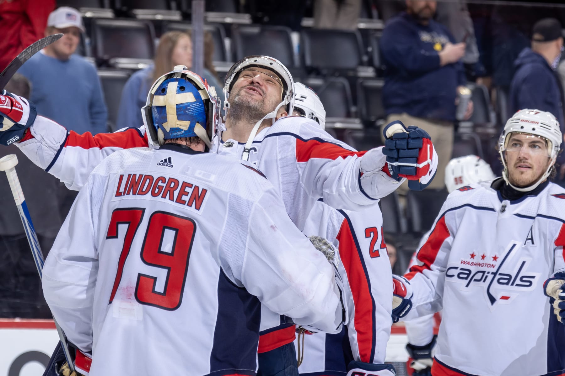 DETROIT, MI - APRIL 09: Alex Ovechkin #8 of the Washington Capitals celebrates the victory over the Detroit Red Wings with Charlie Lindgren #79 at Little Caesars Arena on April 9, 2024 in Detroit, Michigan. Washington defeated Detroit 2-1. (Photo by Dave Reginek/NHLI via Getty Images)